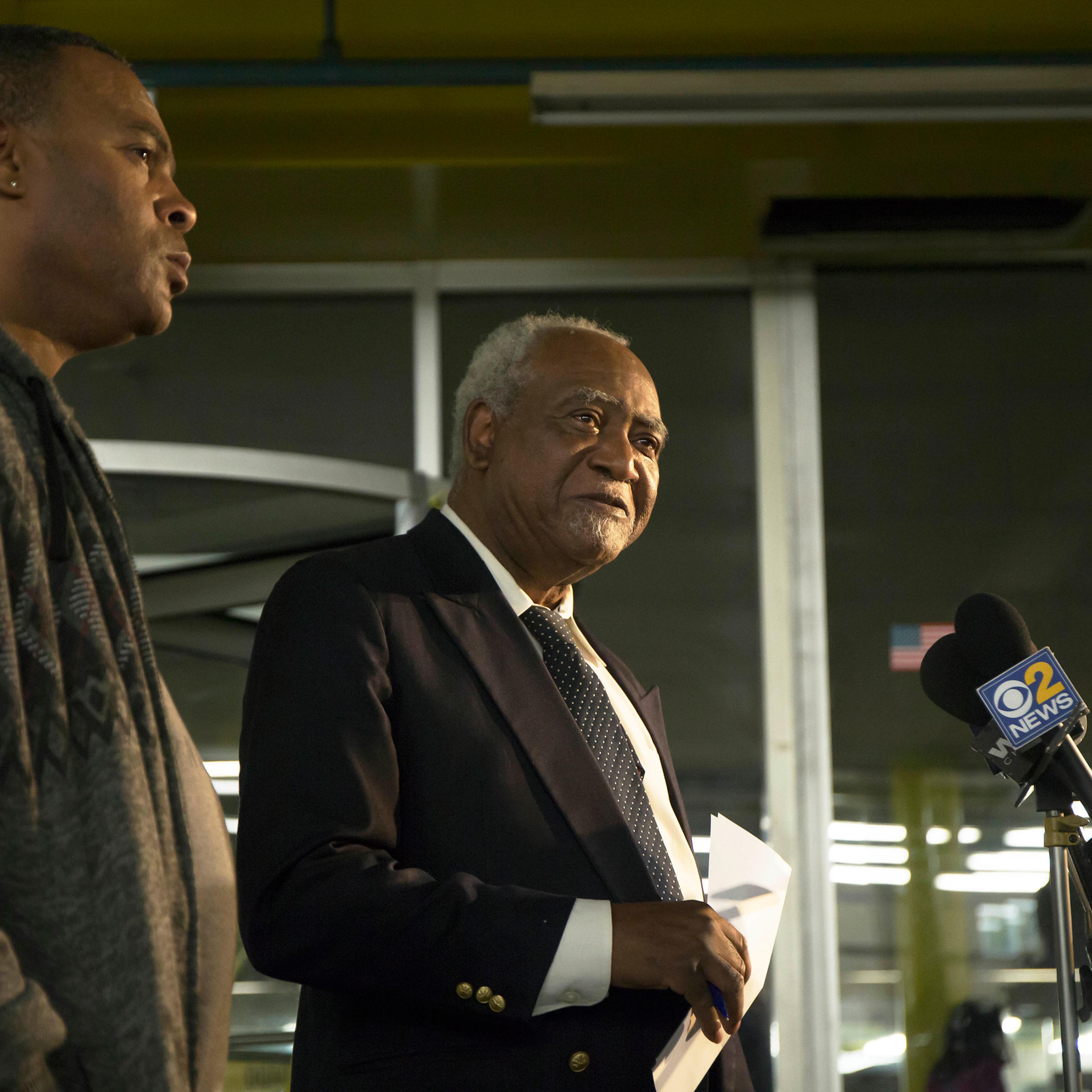 In this Friday, Nov. 18, 2016 photo, U.S. Rep. Danny Davis, D-Ill., center, and his son, Stacey Wilson, give a news conference at the 5th District police department in the Englewood neighborhood of Chicago. Fifteen-year-old Javon Wilson, the grandson of
