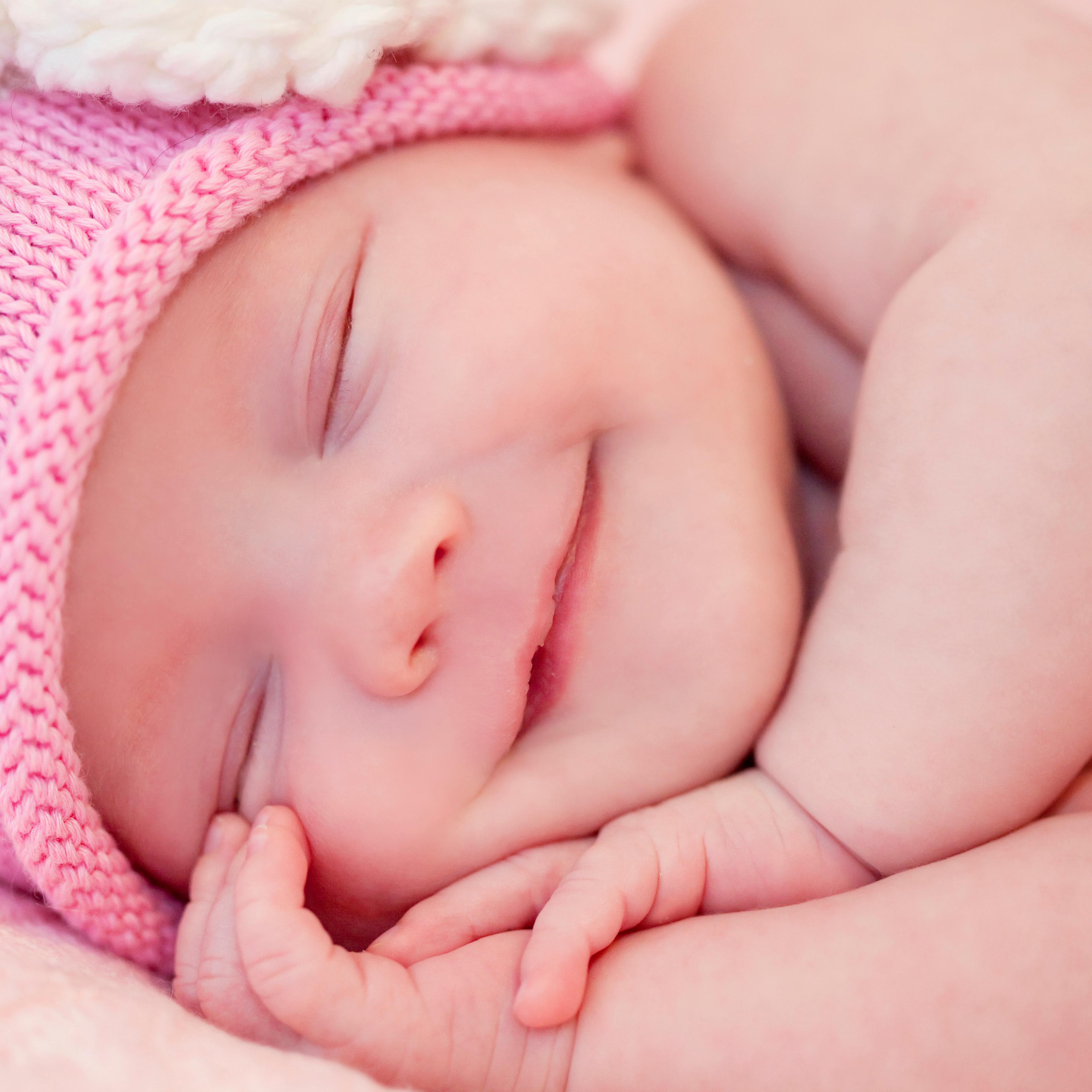 Baby girl smiles