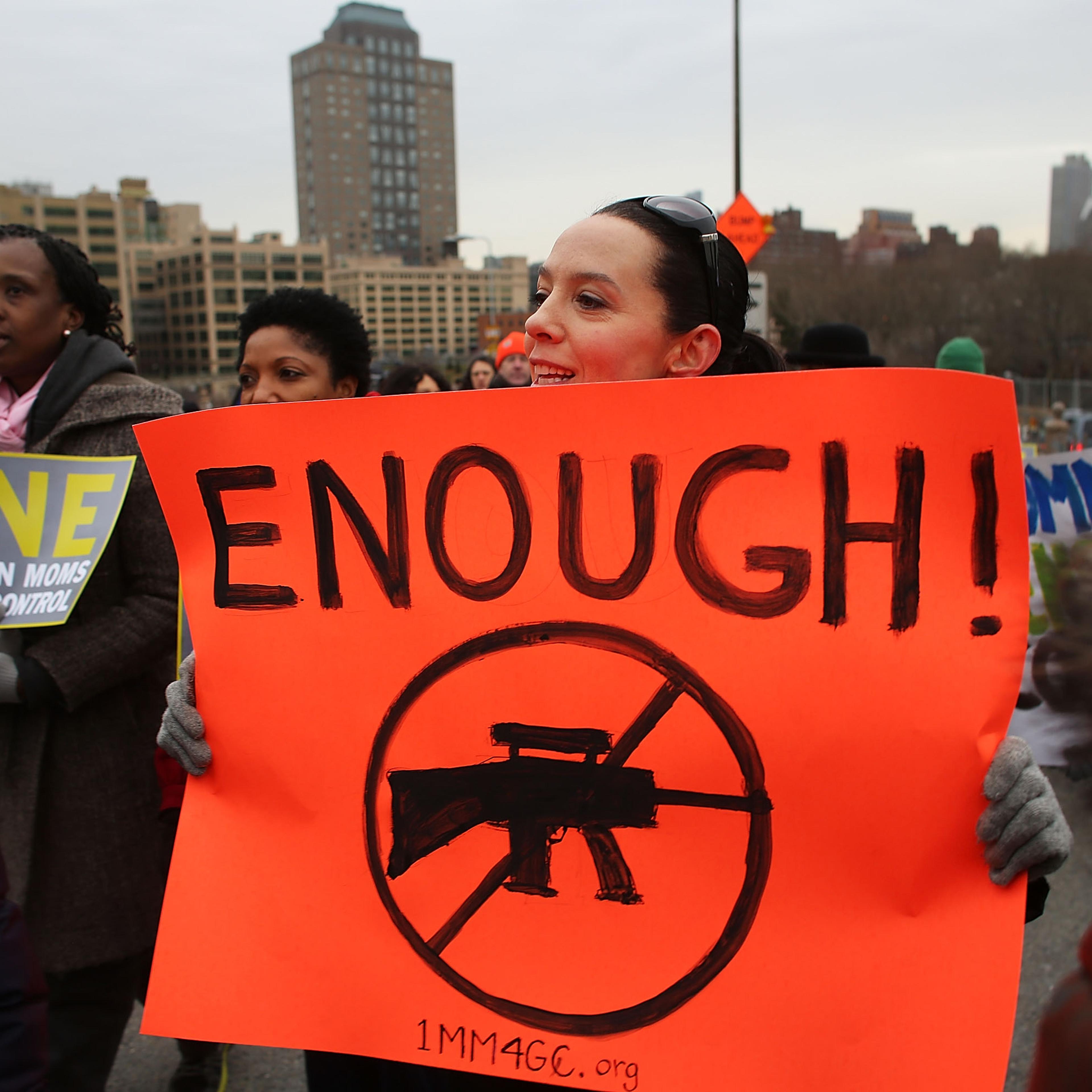 Gun control activists march across Brooklyn Bridge