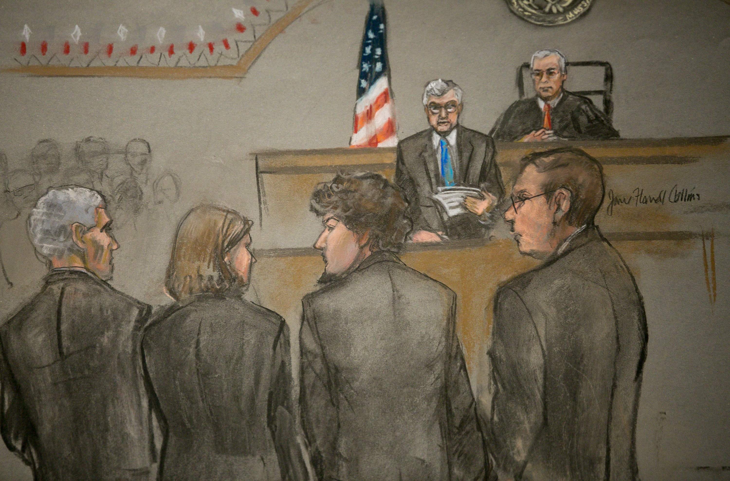 A courtroom sketch shows Boston Marathon bombing suspect Dzhokhar Tsarnaev (2nd R) and his defense team as the verdict is read at the federal courthouse in Boston on April 8, 2015.