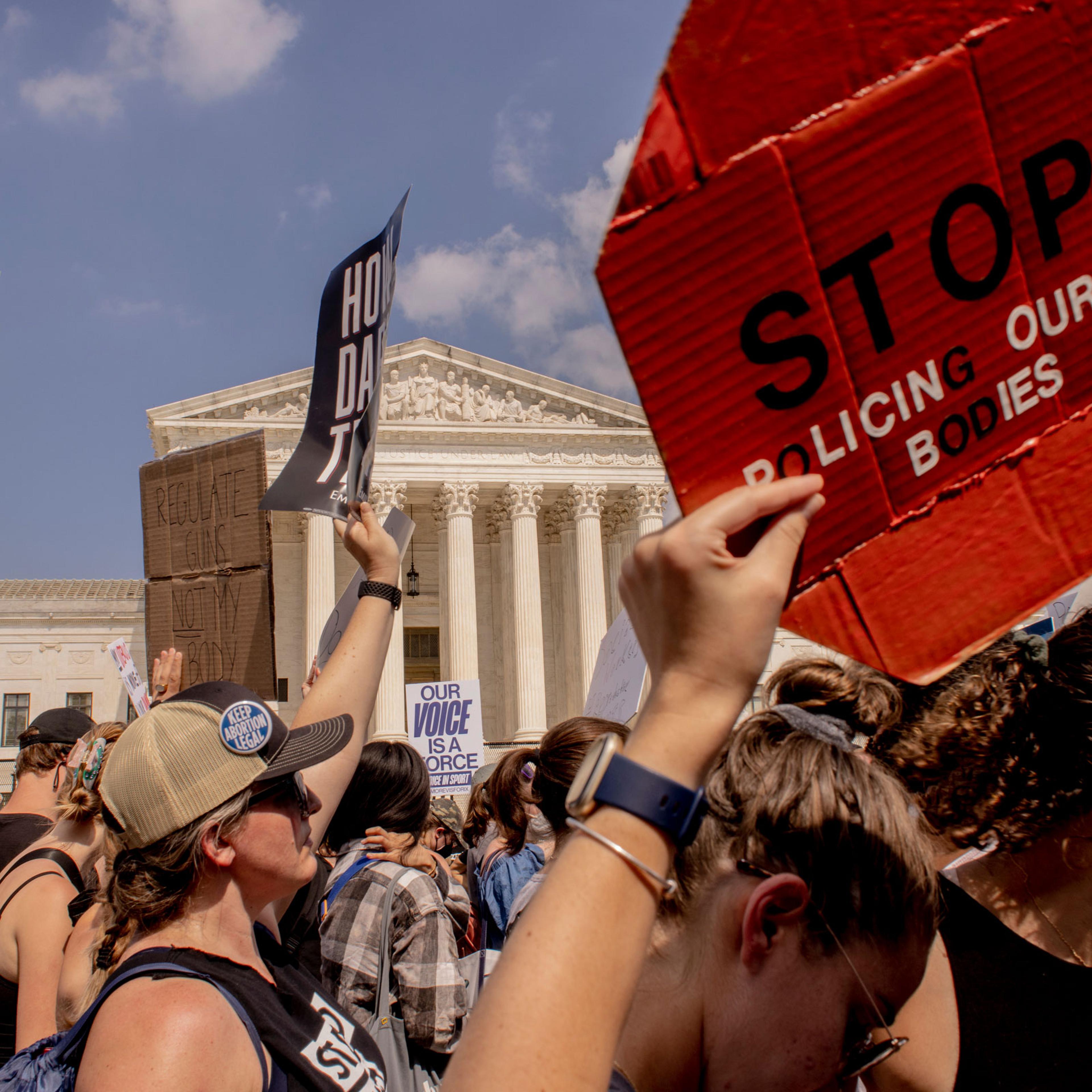 The scene outside the Supreme Court after the Court announced a ruling in the Dobbs v Jackson Women's Health Organization case on June 24, 2022 in Washington, DC.