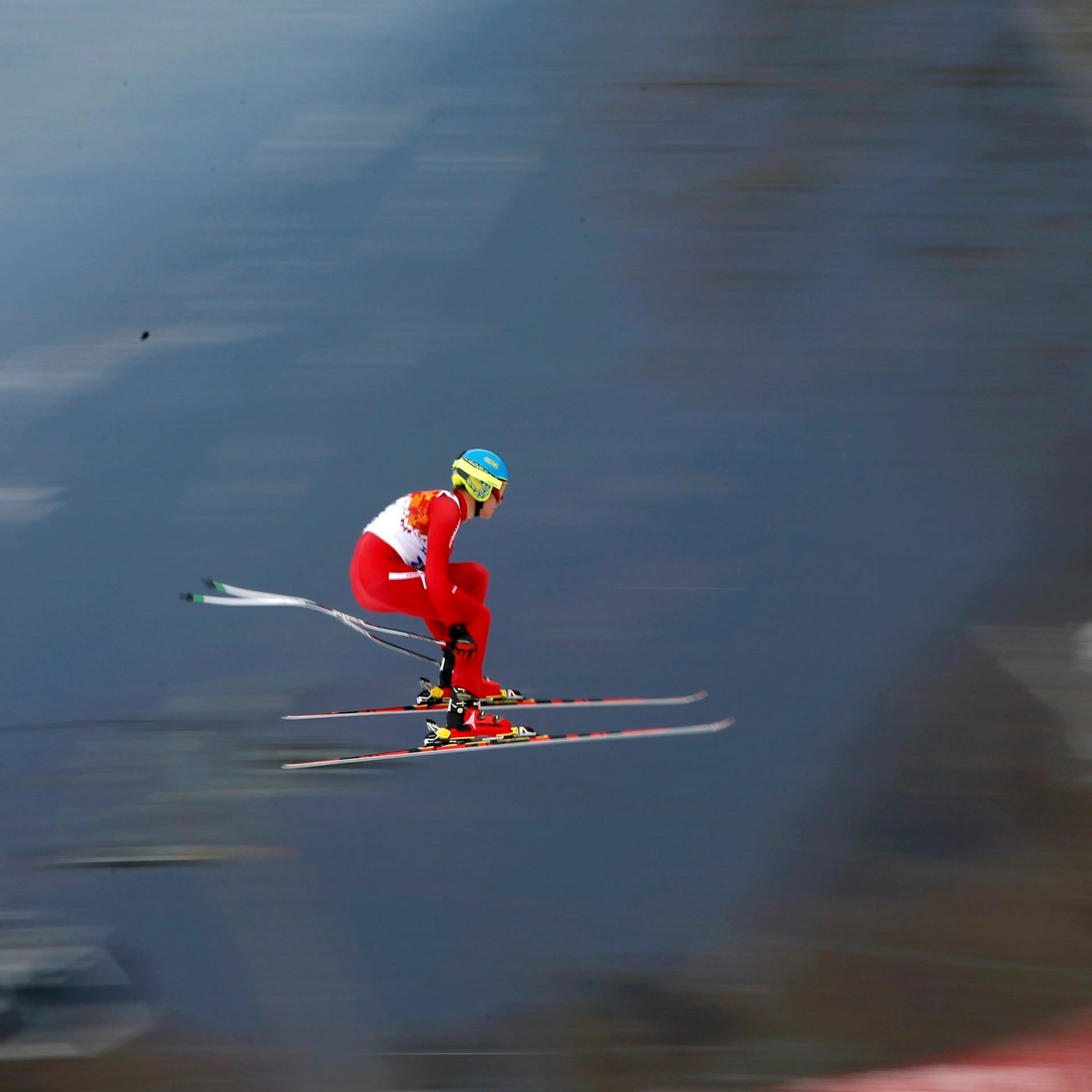 Denmark's Christoffer Faarup goes airborne during the downhill run of the men's alpine skiing super combined training session.