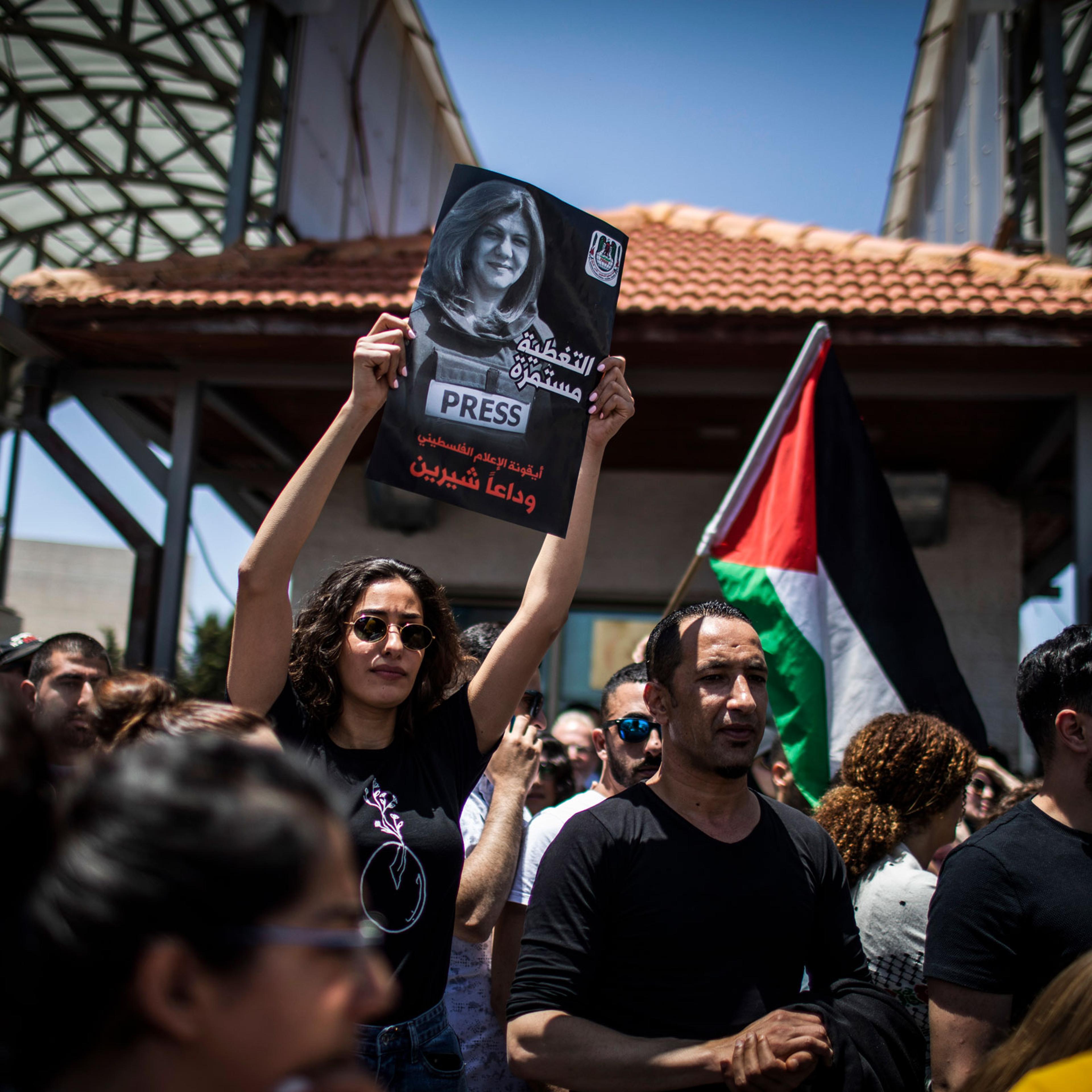 Palestinians attend the state funeral of Al Jazeera reporter Shireen Abu Akleh