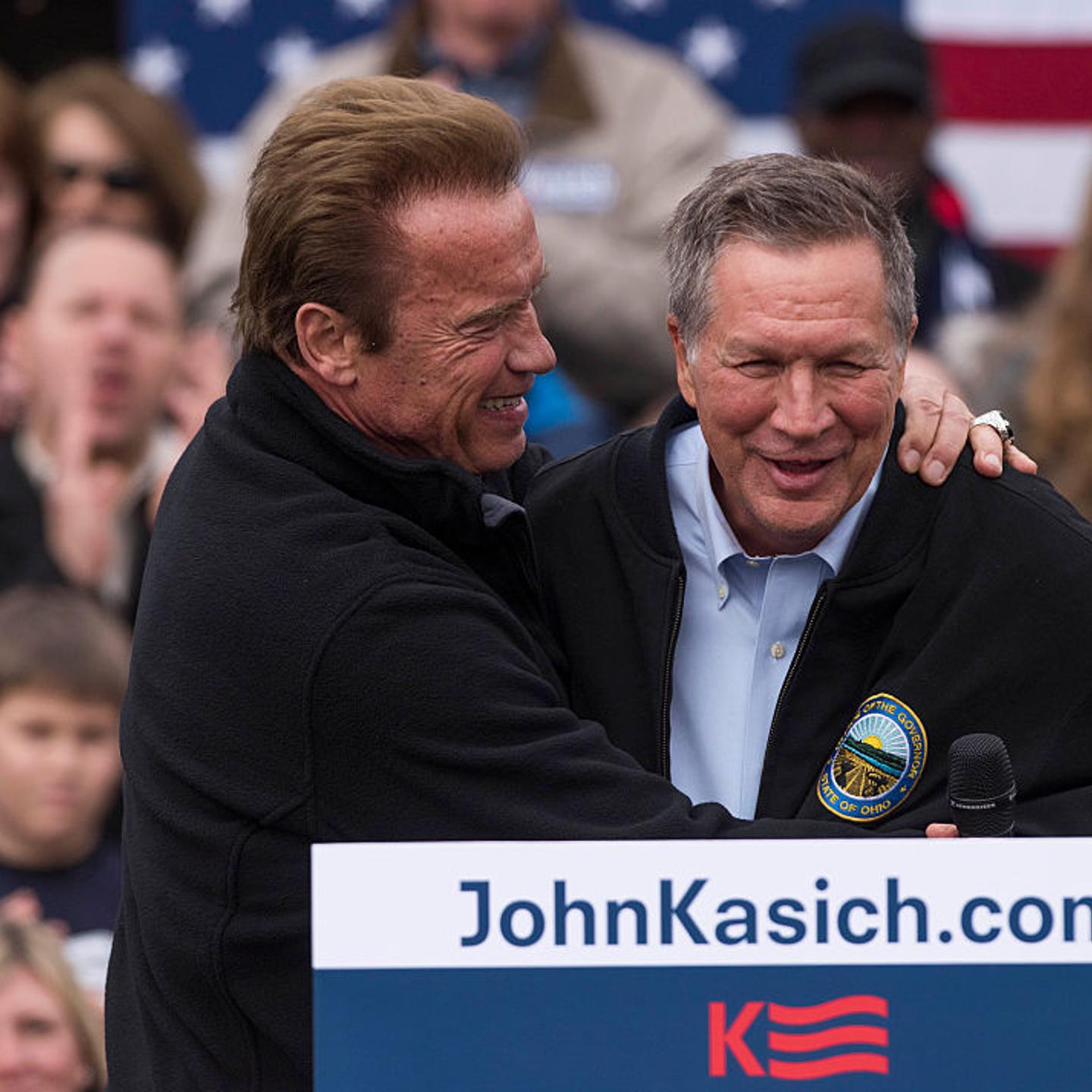 Ohio Gov. John Kasich is embraced by former California Governor Arnold Schwarzenegger before taking to the podium during a campaign rally at the Wells Barns at the Franklin Park Conservatory on March 6, 2016 in Columbus, Ohio.