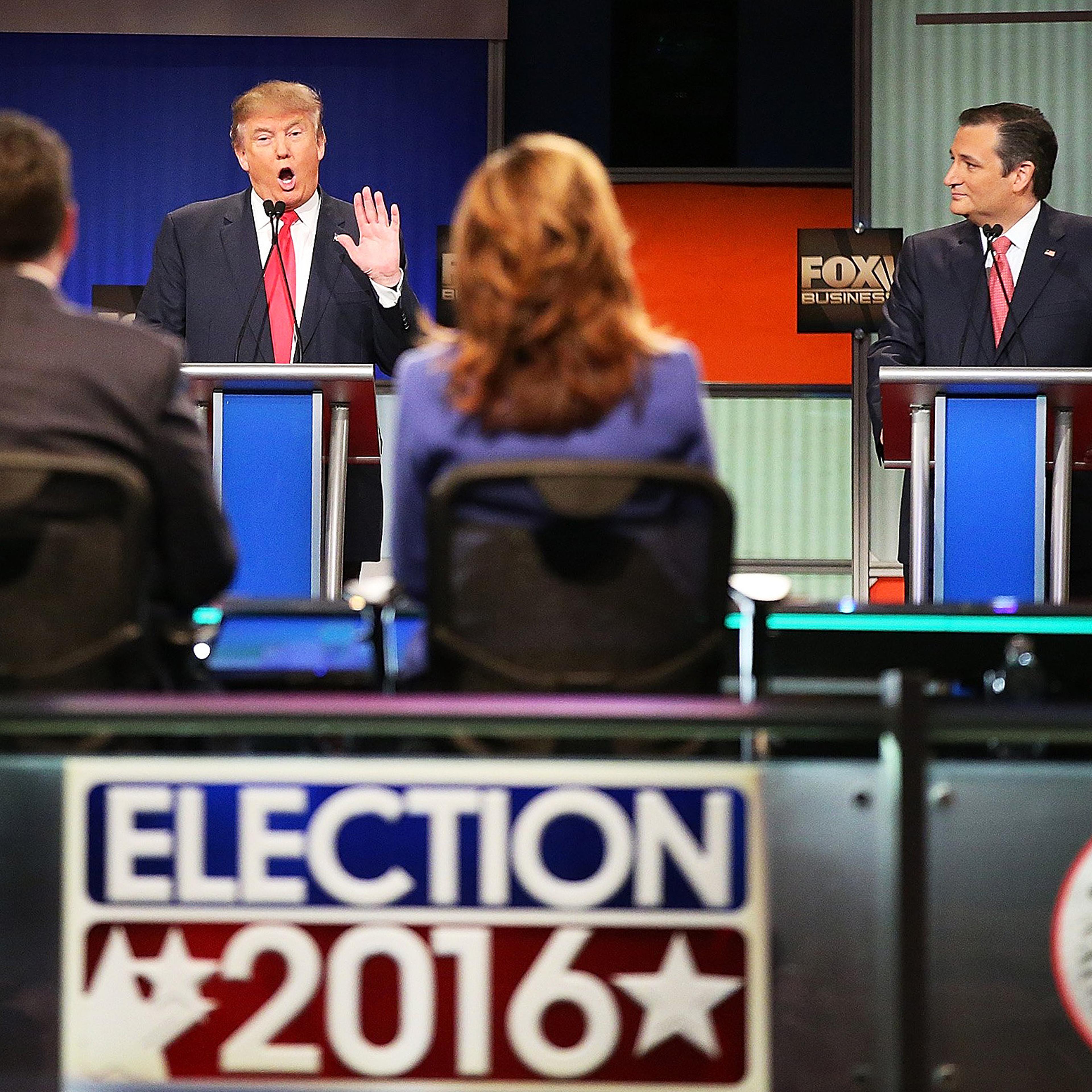 Republican presidential candidates Donald Trump and Sen. Ted Cruz (R-TX) participate in the Republican presidential debate at the North Charleston Coliseum and Performing Arts Center on Jan. 14, 2016 in North Charleston, S.C.