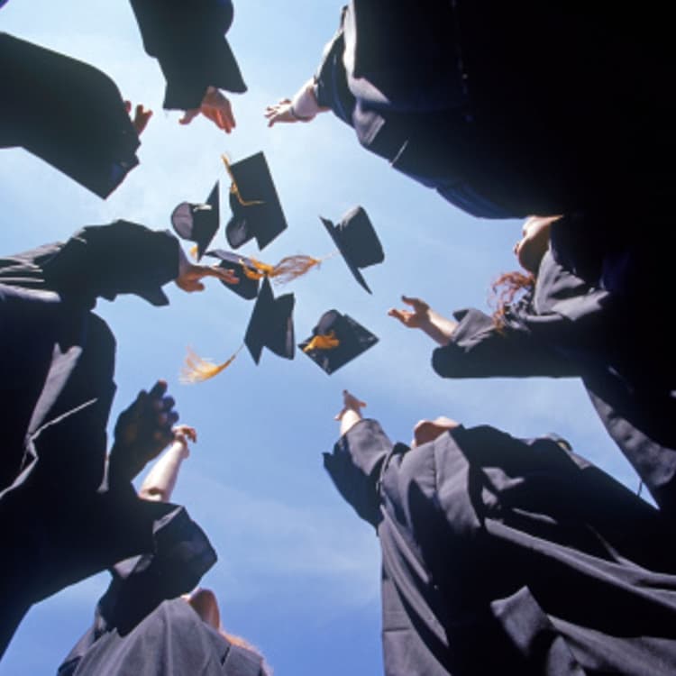 graduates-throwing-caps