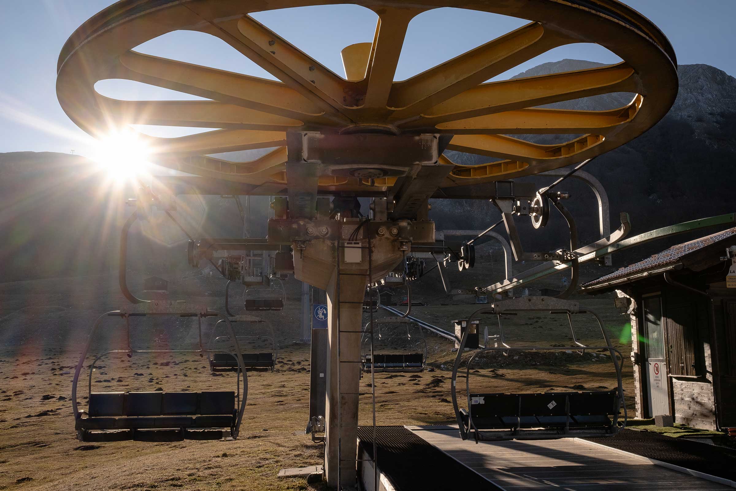 A chairlift leading to a slope at the Campitello Matese ski resort is closed due to lack of snowfall and high temperatures in  San Massimo, Italy on Jan. 7, 2023.