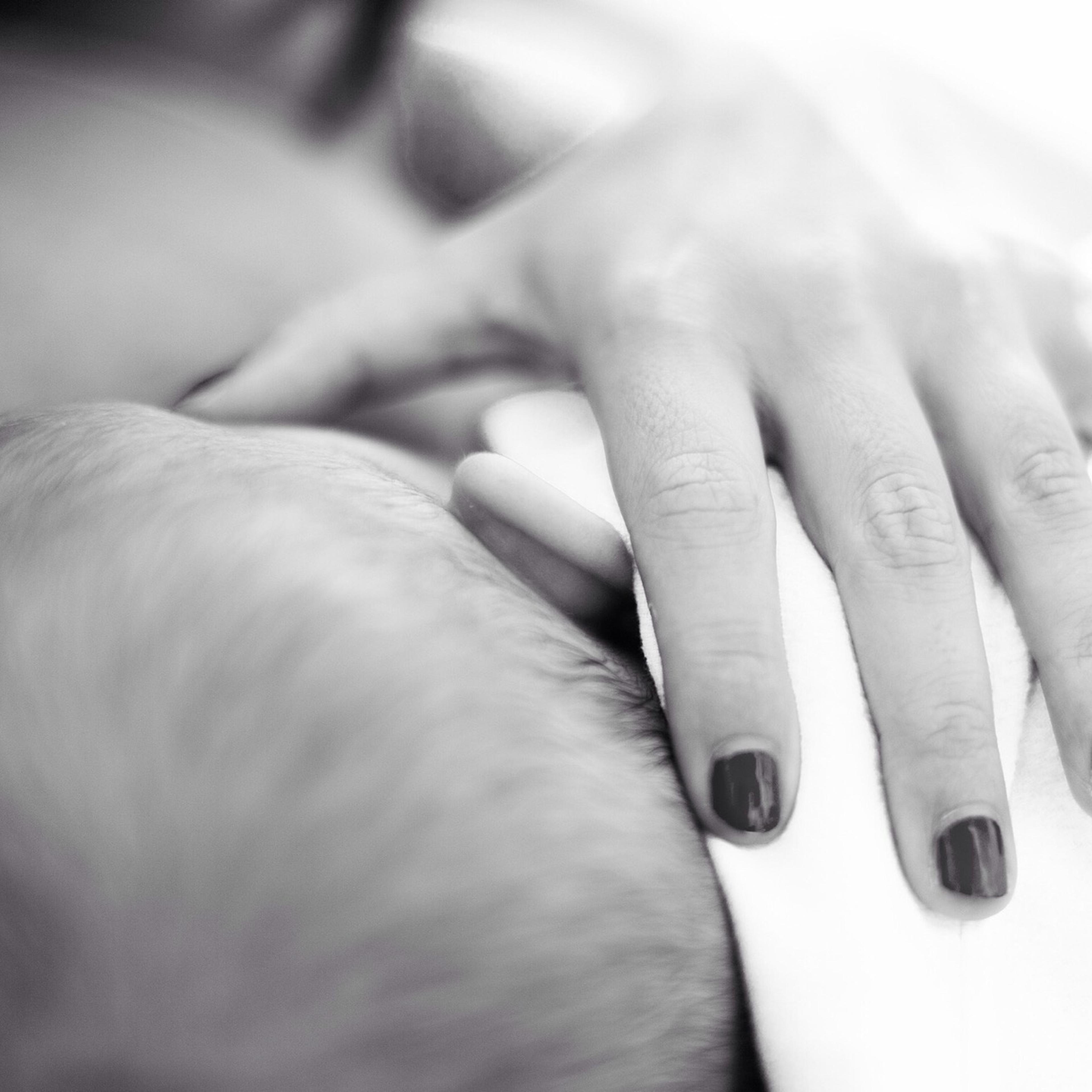 Mother breast-feeds baby