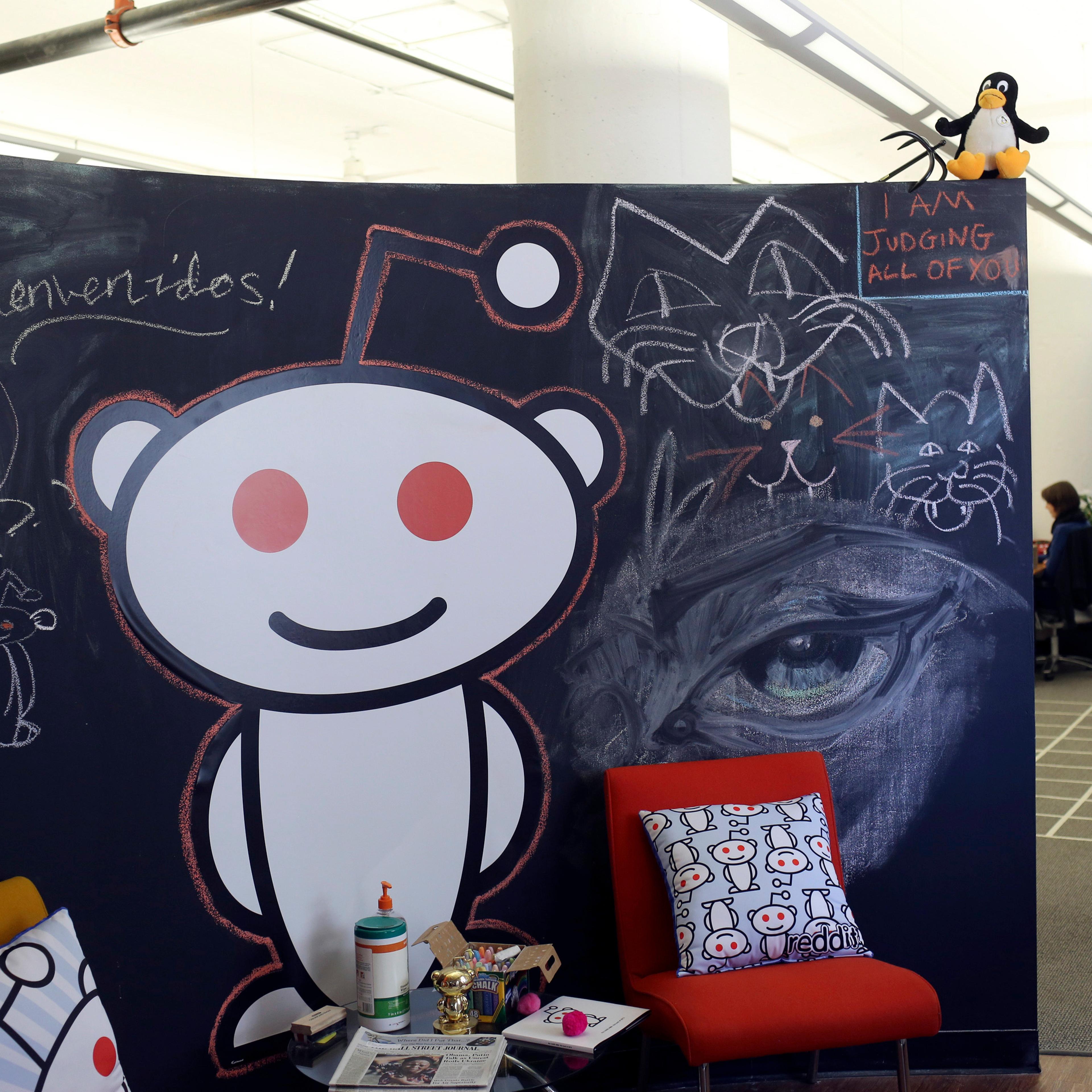 A Reddit mascot is shown at the company's headquarters in San Francisco, California April 15, 2014. Reddit, a website with a retro-'90s look and space-alien mascot that tracks everything from online news to celebrity Q&As, is going after more eyeballs, a