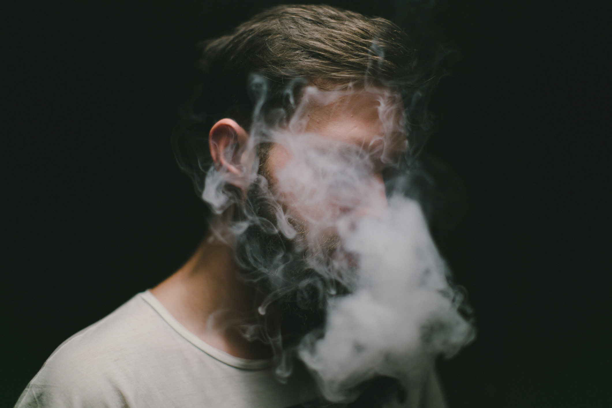 Closeup of man vaping