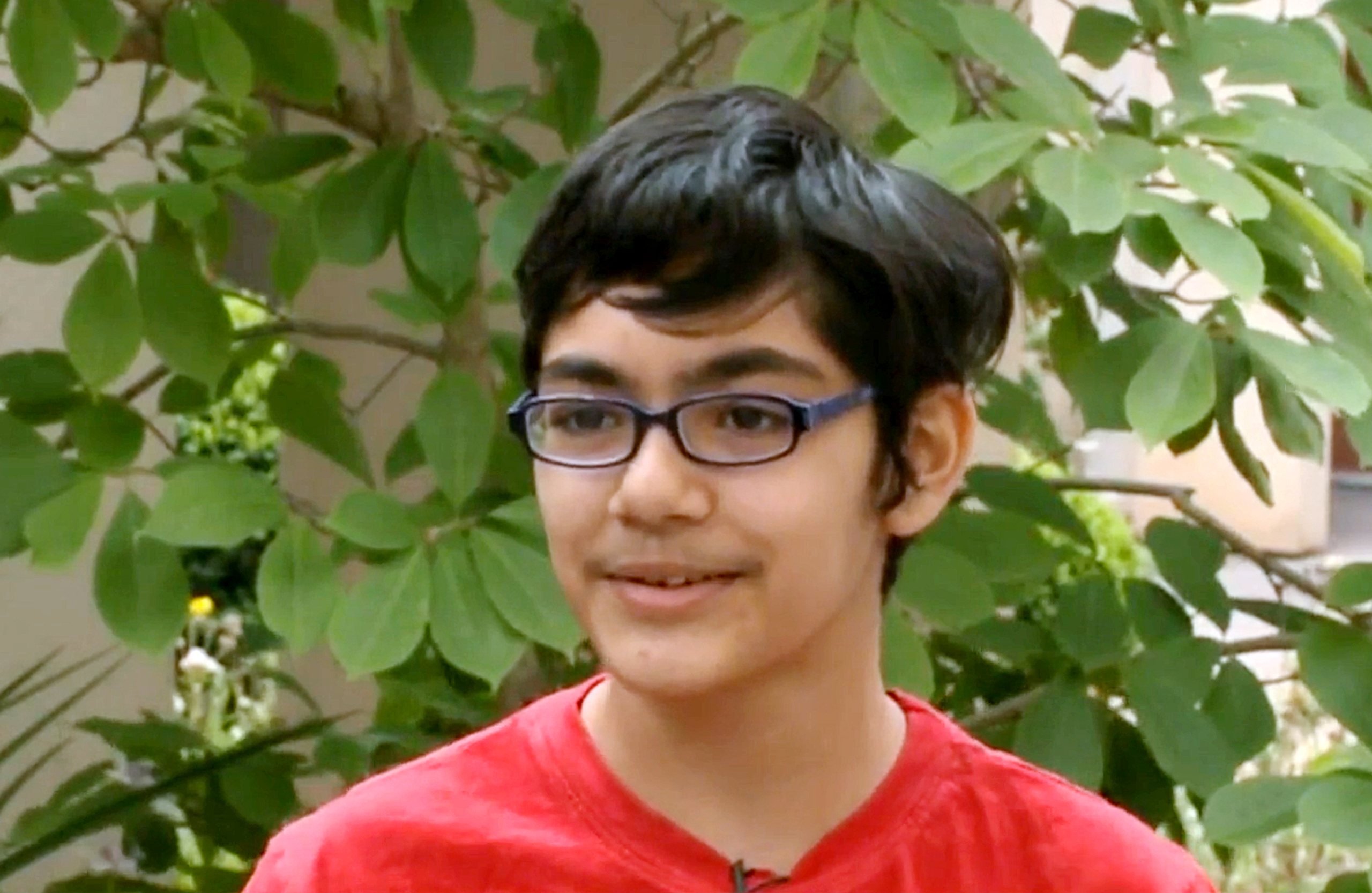 In this recent but undated frame from video provided by KOVR-TV, Tanishq Abraham, 12, talks about his recent graduation from community college and beginning his university education this fall, in an interview at American River College in Sacramento, Cali