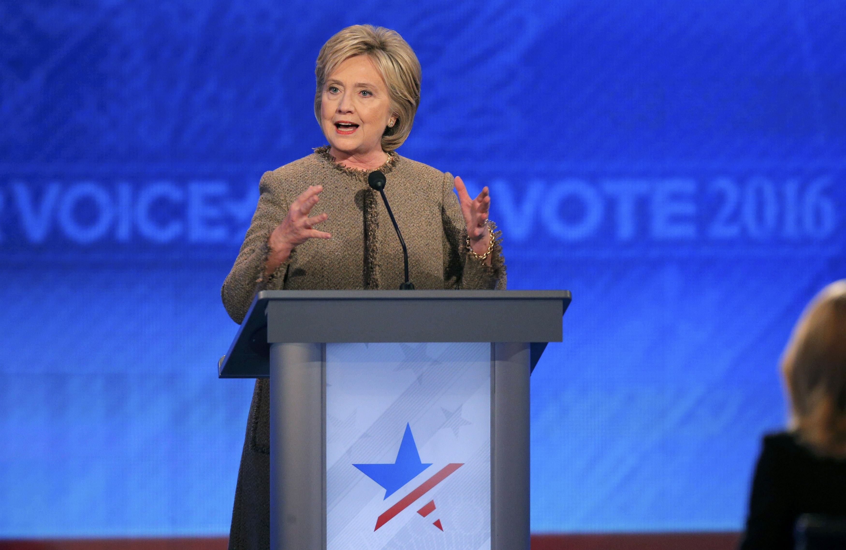 Democratic U.S. presidential candidate and former Secretary of State Hillary Clinton answers a question at the Democratic presidential candidates debate at St. Anselm College in Manchester