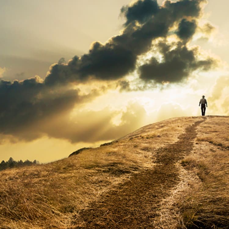 man-walking-hill