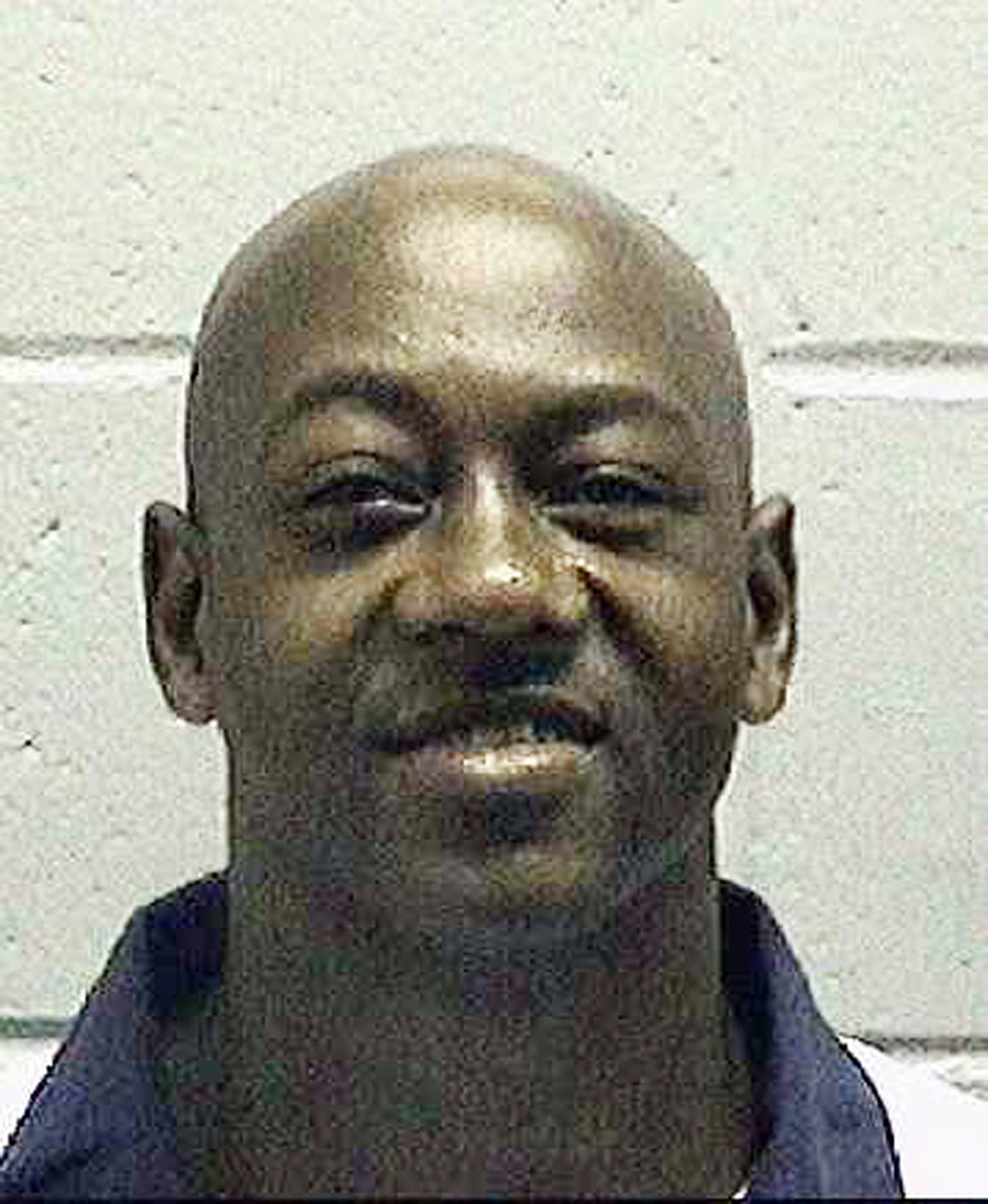 This undated photo made available by the Georgia Department of Corrections, shows Timothy Tyrone Foster. The Supreme Court has thrown out a death sentence handed to Foster because prosecutors improperly kept African-Americans off the jury that convicted 