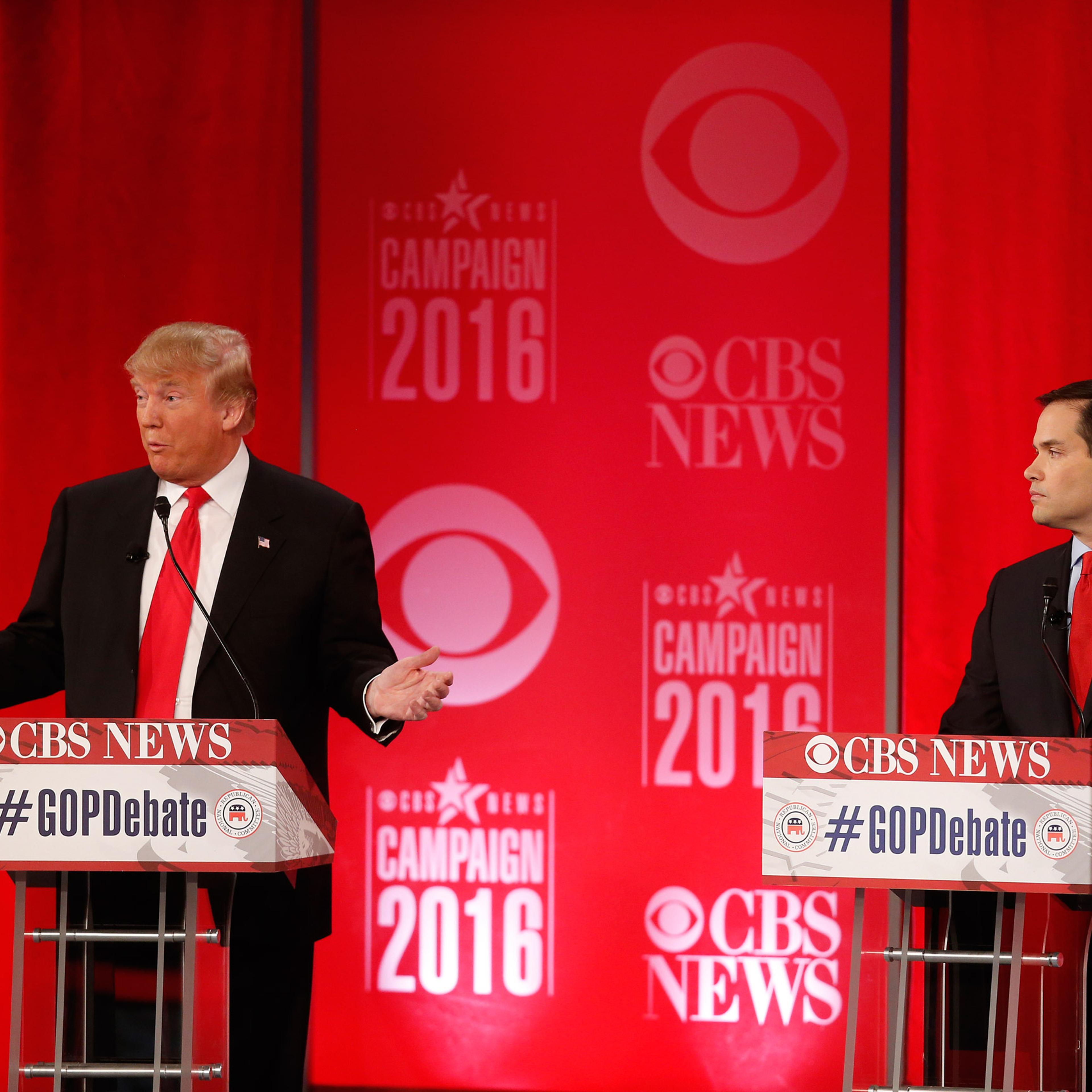 Republican presidential candidate, businessman Donald Trump and Republican presidential candidate, Sen. Marco Rubio, R-Fla., right, participate during the CBS News Republican presidential debate at the Peace Center, Saturday, Feb. 13, 2016, in Greenville