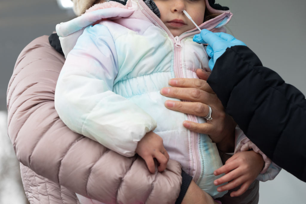 Child getting a COVID-19 test