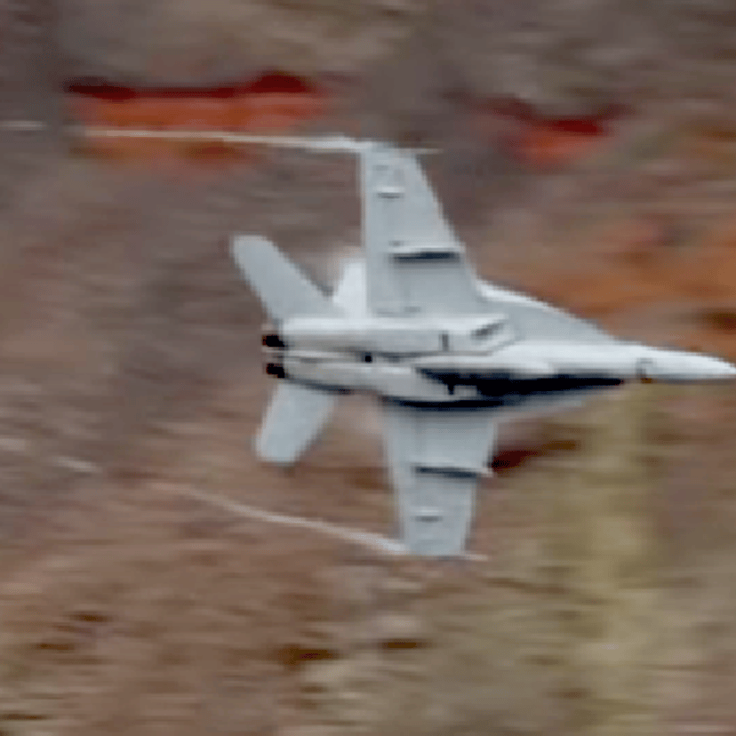 An F-18 shows its belly to an appreciative cameraman on a recent flight through Death Valley.