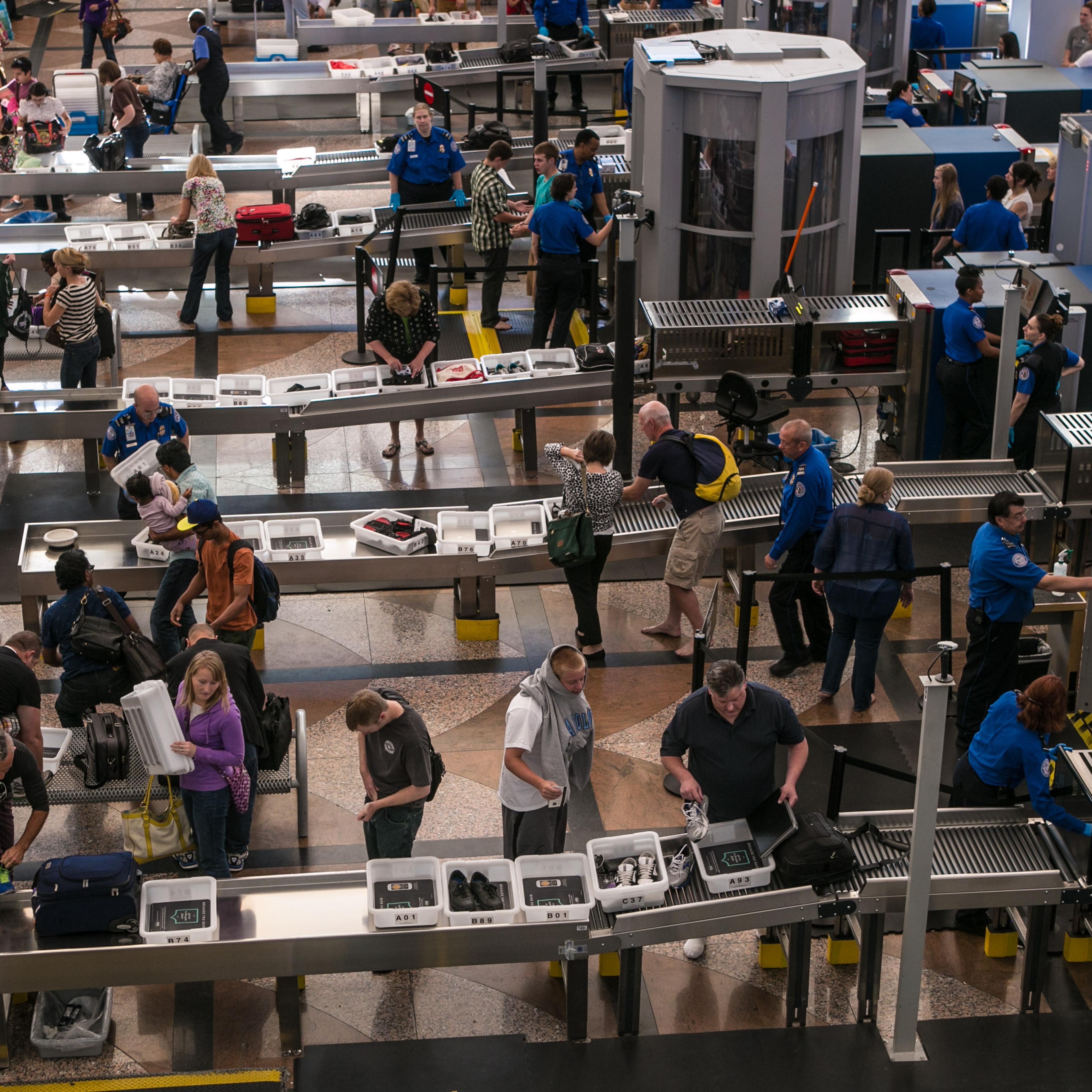 The TSA security lines in the main terminal are crowded with vacation travelers on June 16, 2013, in Denver,.