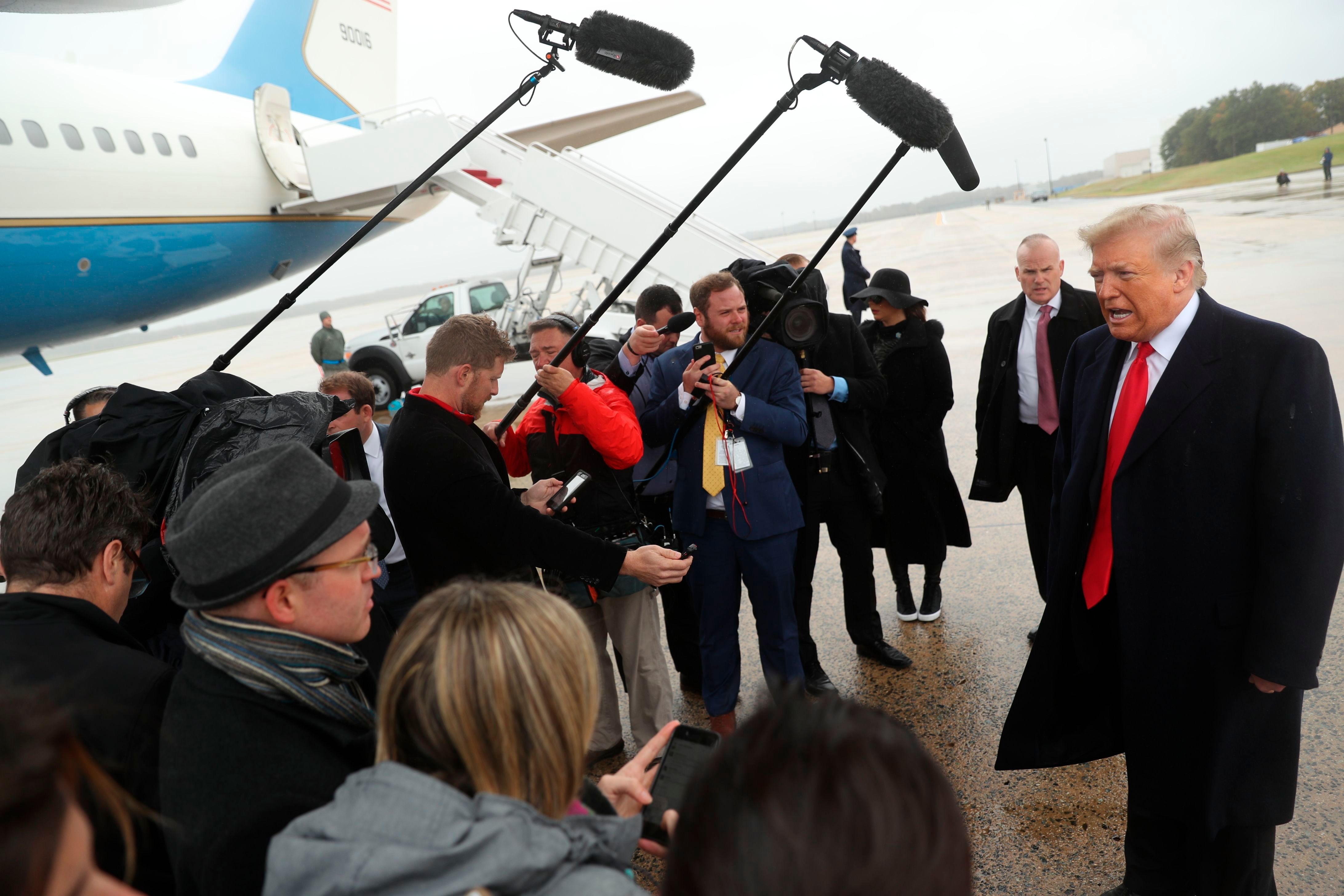 President Donald Trump speaks to the media at Air Force One at Andrews Air Force Base