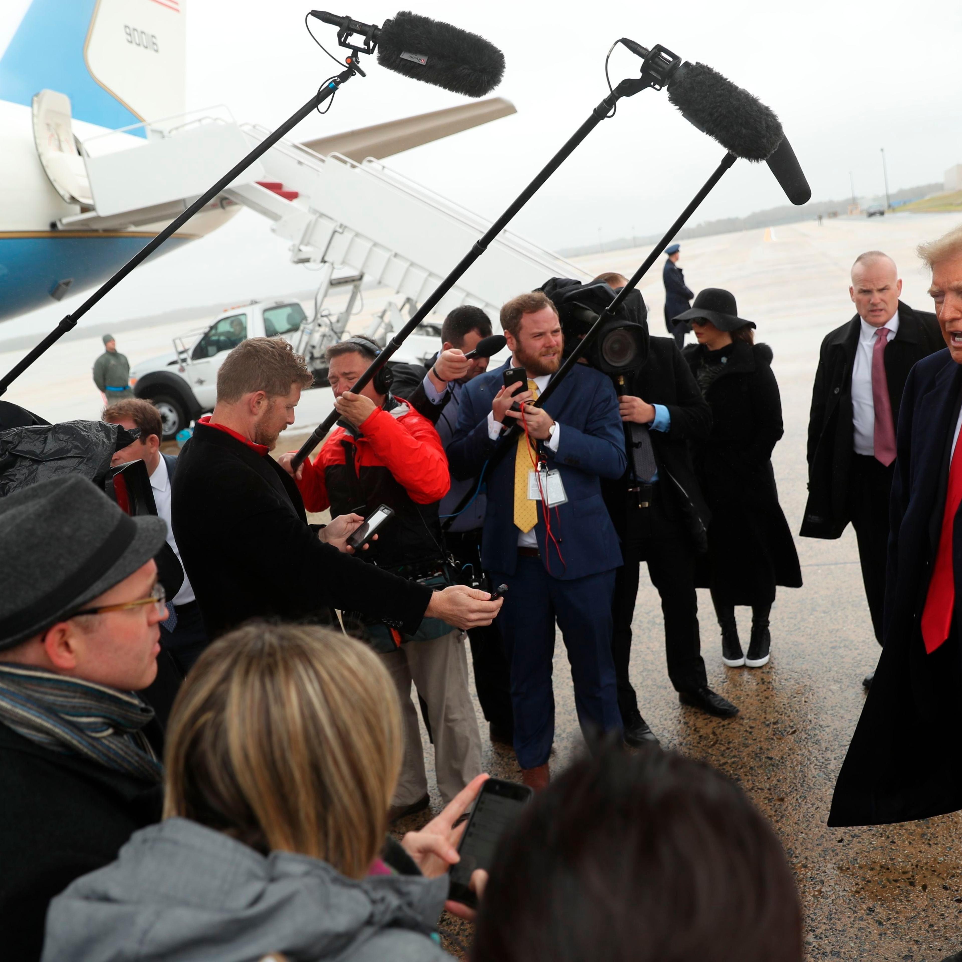 President Donald Trump speaks to the media at Air Force One at Andrews Air Force Base
