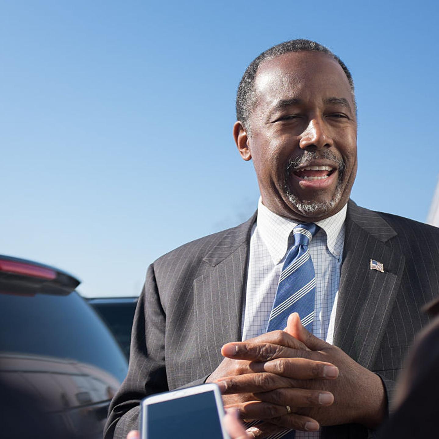 Republican presidential candidate Ben Carson speaks to reporters after stopping at The Airport Diner on Feb. 7, 2016 in Manchester, New Hampshire.
