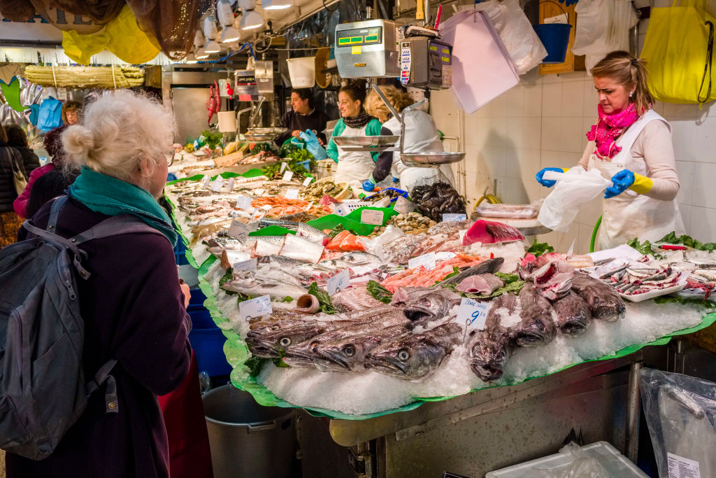 Different sorts of fresh fish are sold inside the Mercat de