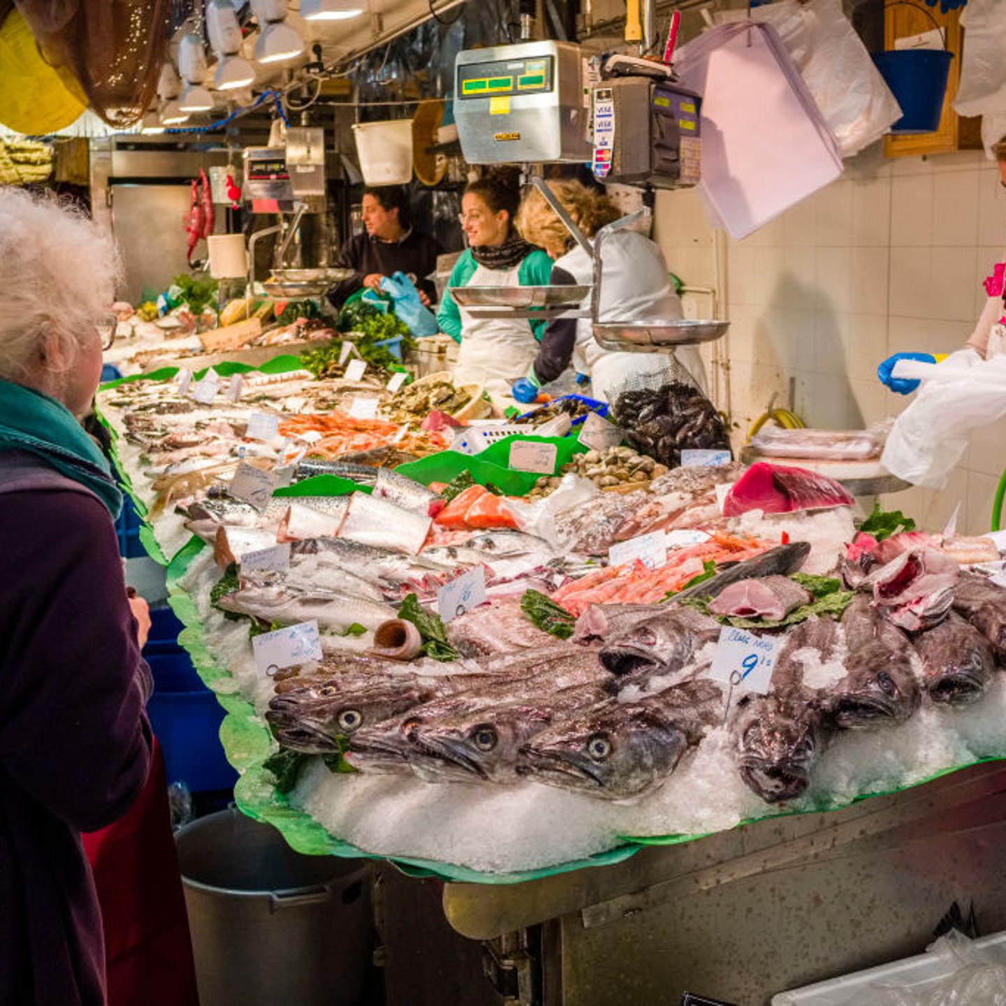 Different sorts of fresh fish are sold inside the Mercat de