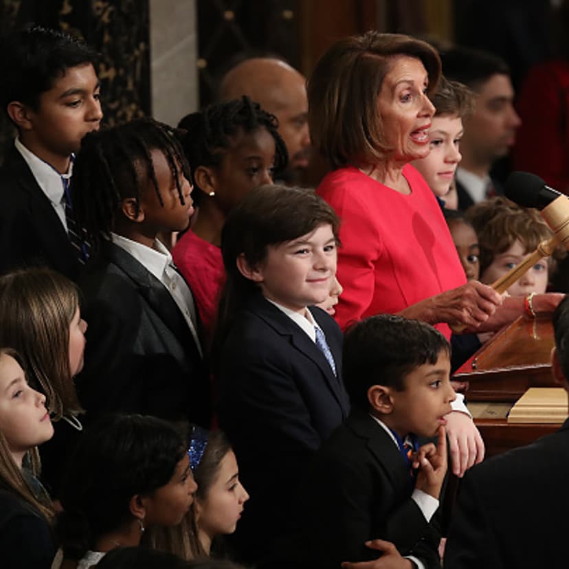 Surrounded by grandchildren and children of members of the House of Representatives, Speaker of the House Nancy Pelosi (D-CA) wields her gavel following her election as the next Speaker of the House during the first session of the 116th Congress at the U