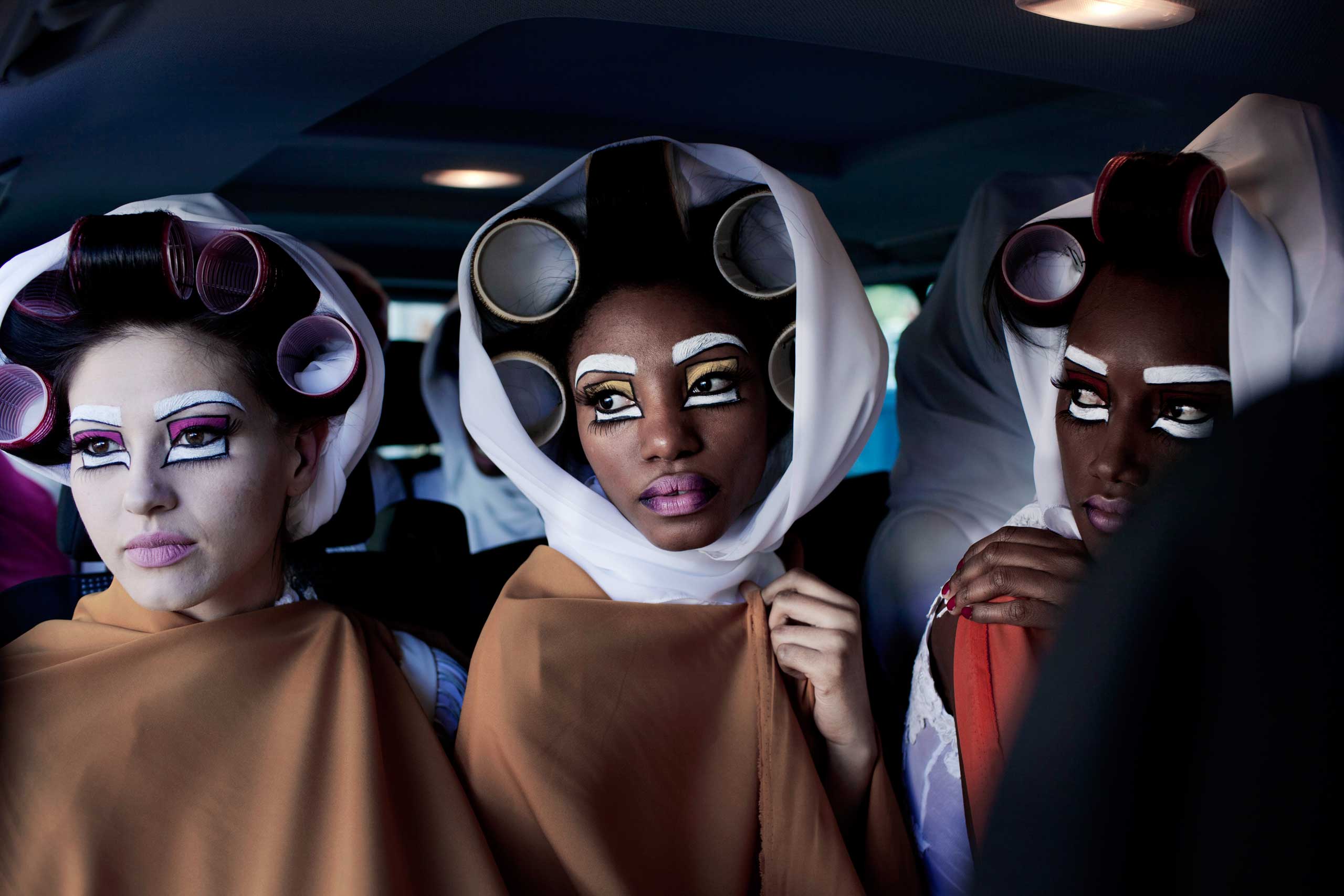 Models for the designer label David Tlale during a fashion show at the colored community in Bo-Kaap at the Mercedes Benz Cape Town Fashion Week on July 28, 2012, in Cape Town, South Africa.
