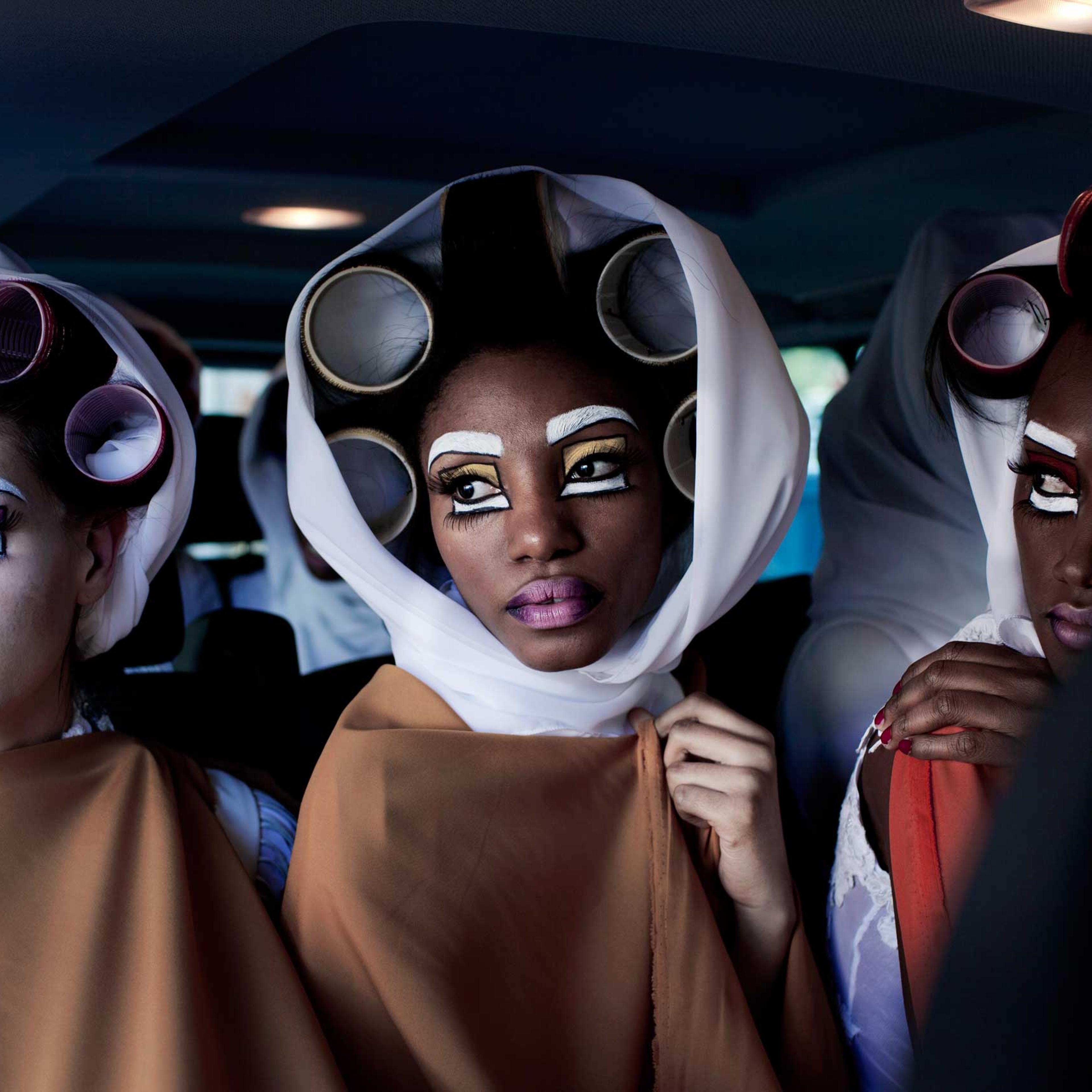 Models for the designer label David Tlale during a fashion show at the colored community in Bo-Kaap at the Mercedes Benz Cape Town Fashion Week on July 28, 2012, in Cape Town, South Africa.