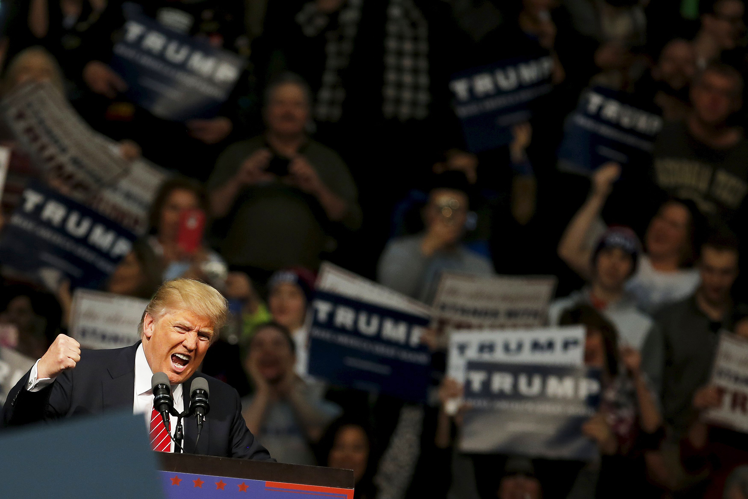 Donald Trump speaks to supporters during a campaign rally in Warren, Michigan on March 4, 2016.