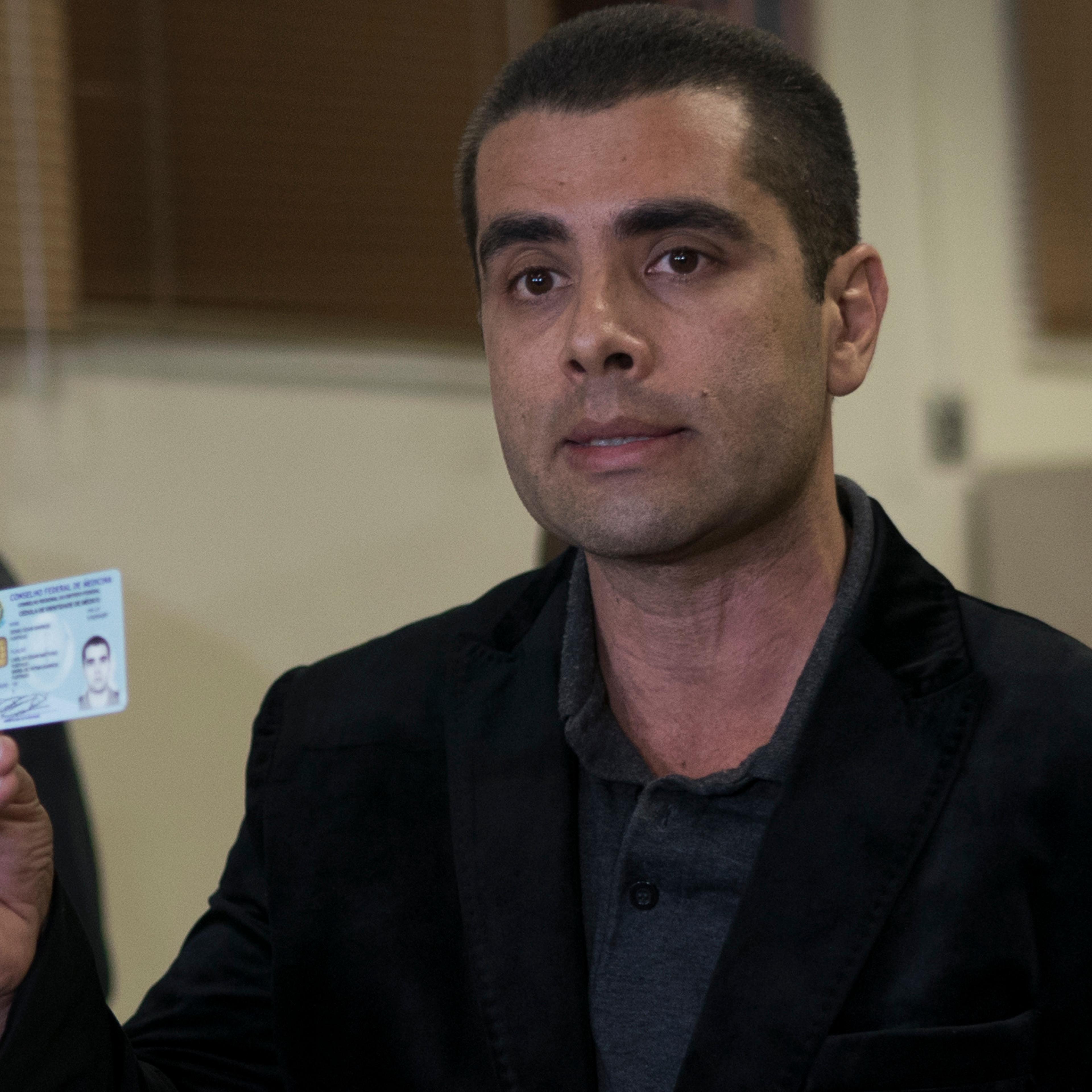 Brazilian plastic surgeon shows his ID