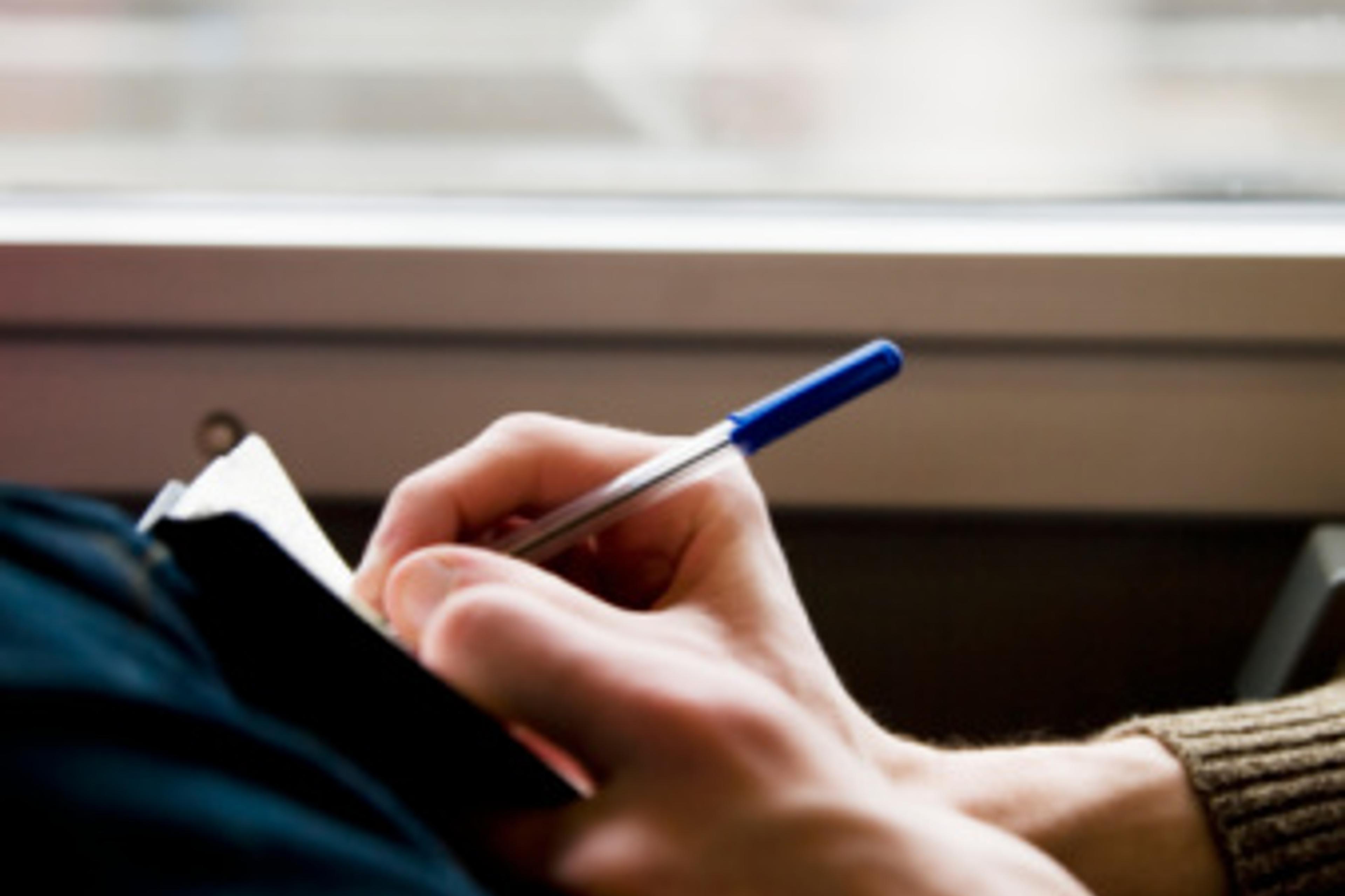 man-writing-diary