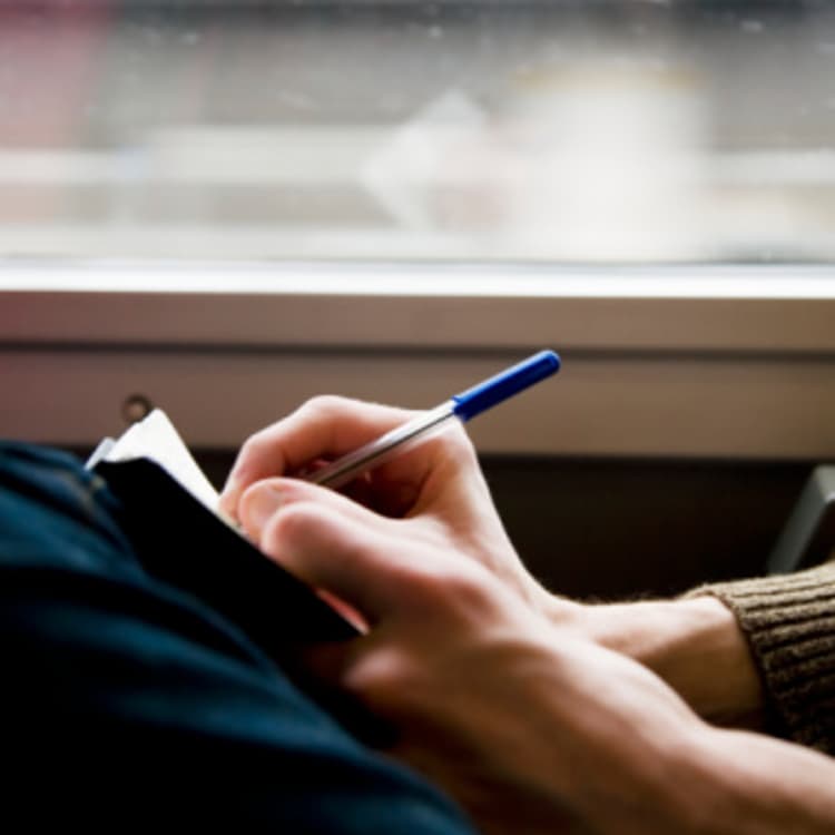 man-writing-diary