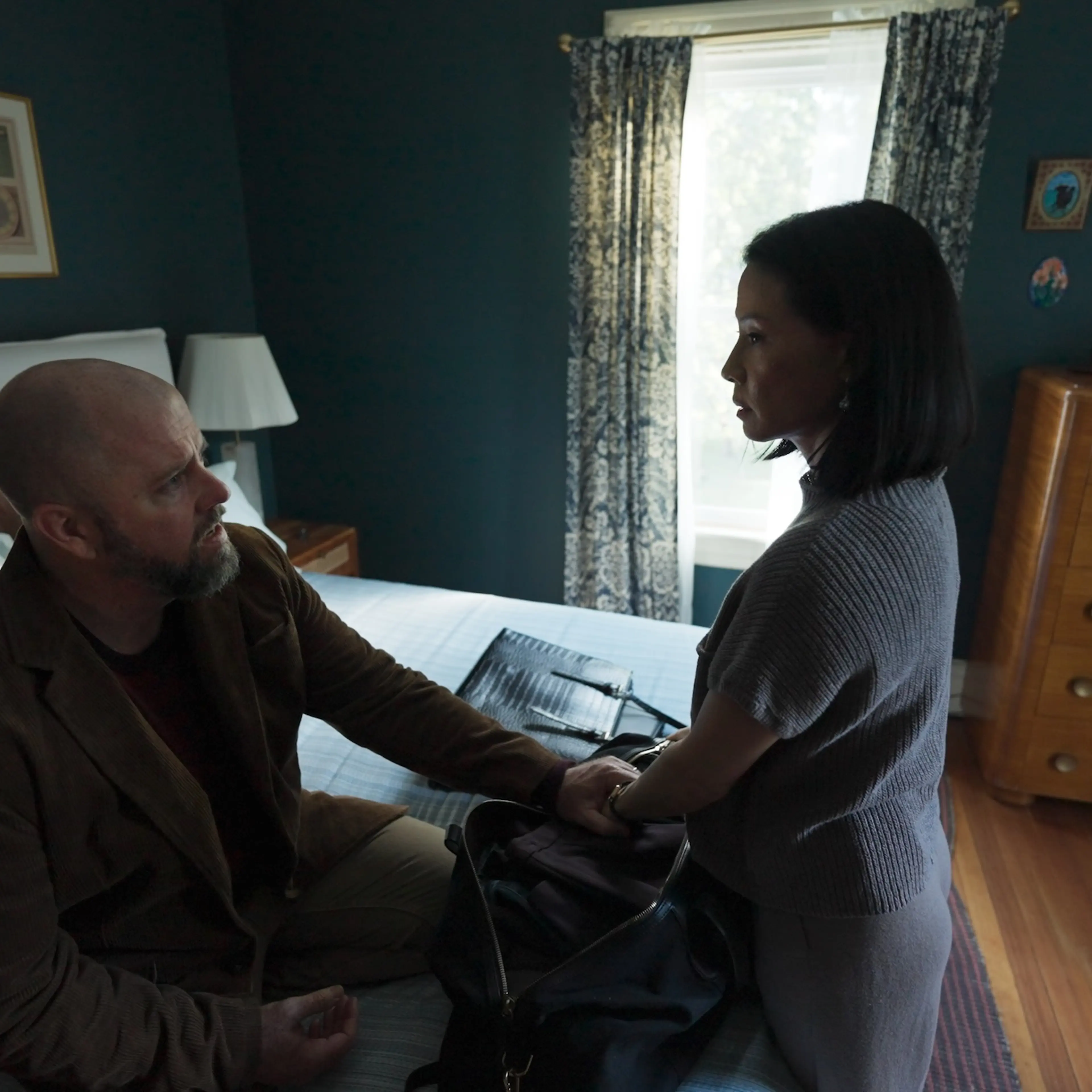Chris Sullivan and Lucy Liu in Presence