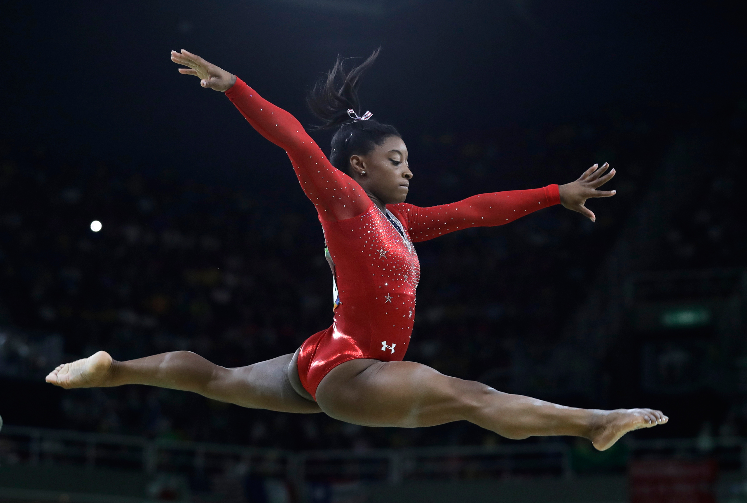 United States' Simone Biles performs on the balance beam during the artistic gymnastics women's apparatus final at the 2016 Summer Olympics in Rio de Janeiro, Brazil, Monday, Aug. 15, 2016. (AP Photo/Rebecca Blackwell)