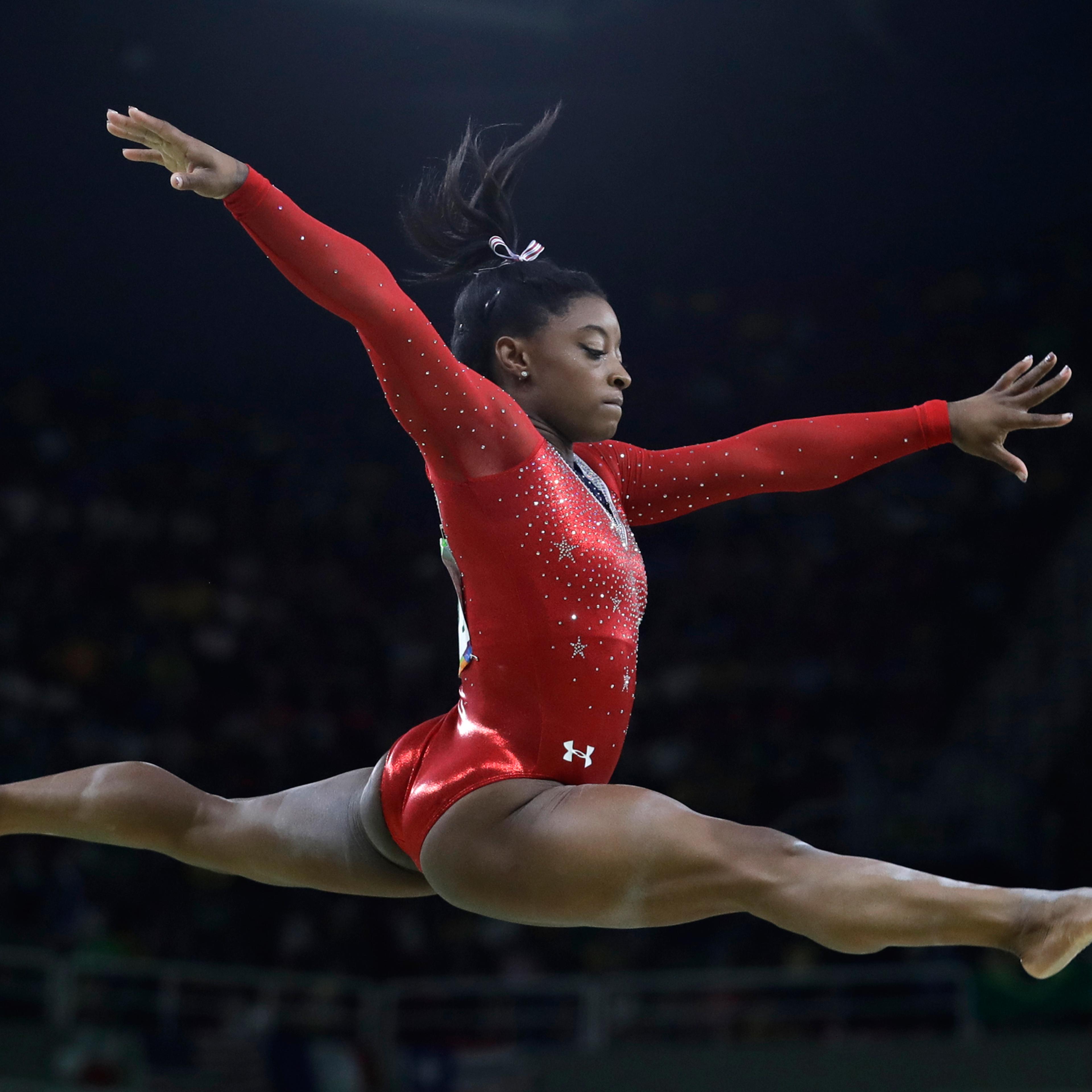 United States' Simone Biles performs on the balance beam during the artistic gymnastics women's apparatus final at the 2016 Summer Olympics in Rio de Janeiro, Brazil, Monday, Aug. 15, 2016. (AP Photo/Rebecca Blackwell)