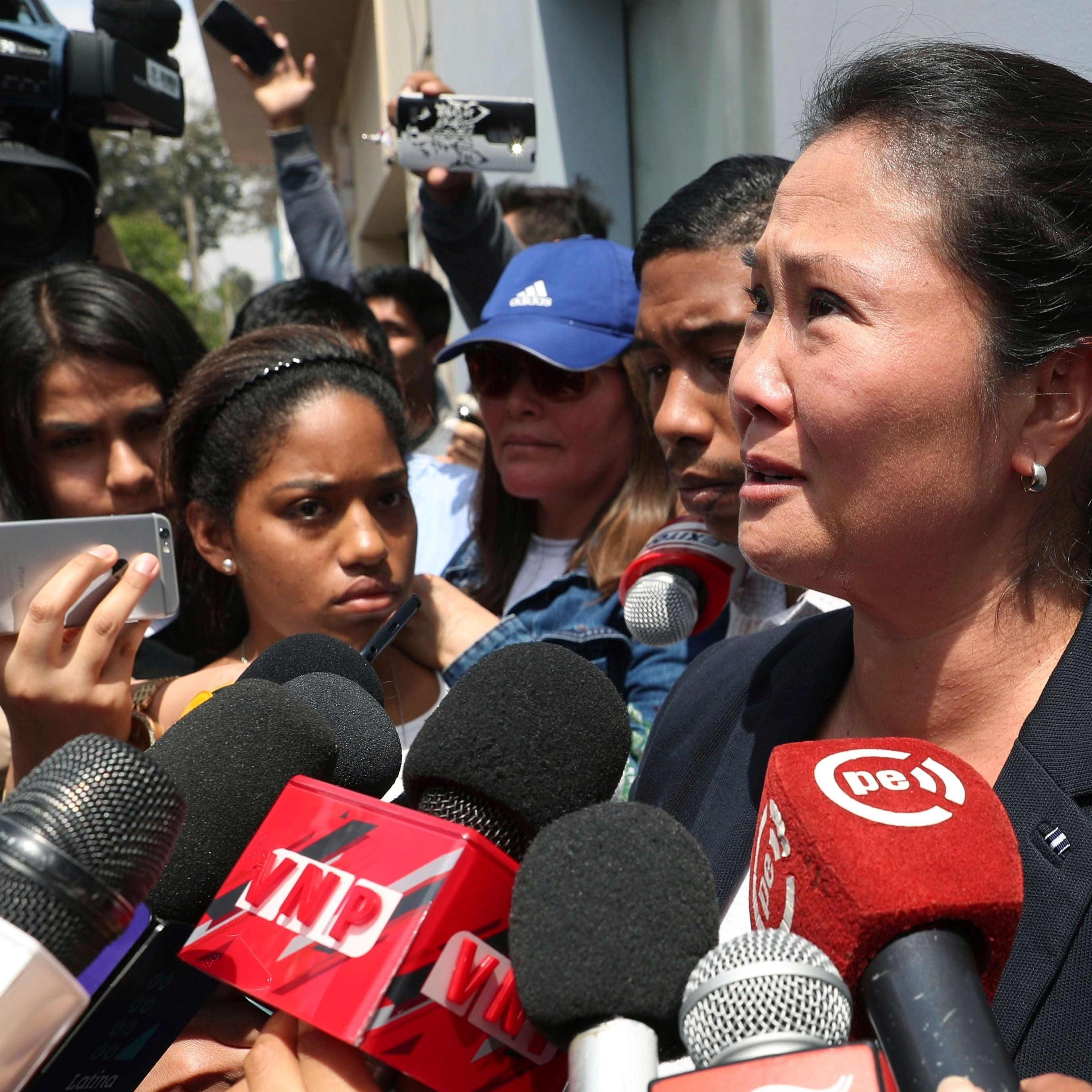 Fujimori speaks to reporters in Peru