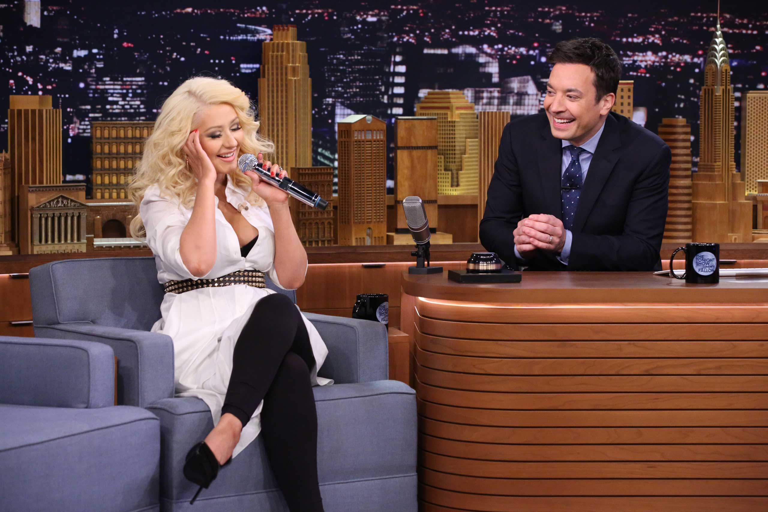 Singer Christina Aguilera and host Jimmy Fallon play Wheels of Impressions on Feb. 23, 2015.