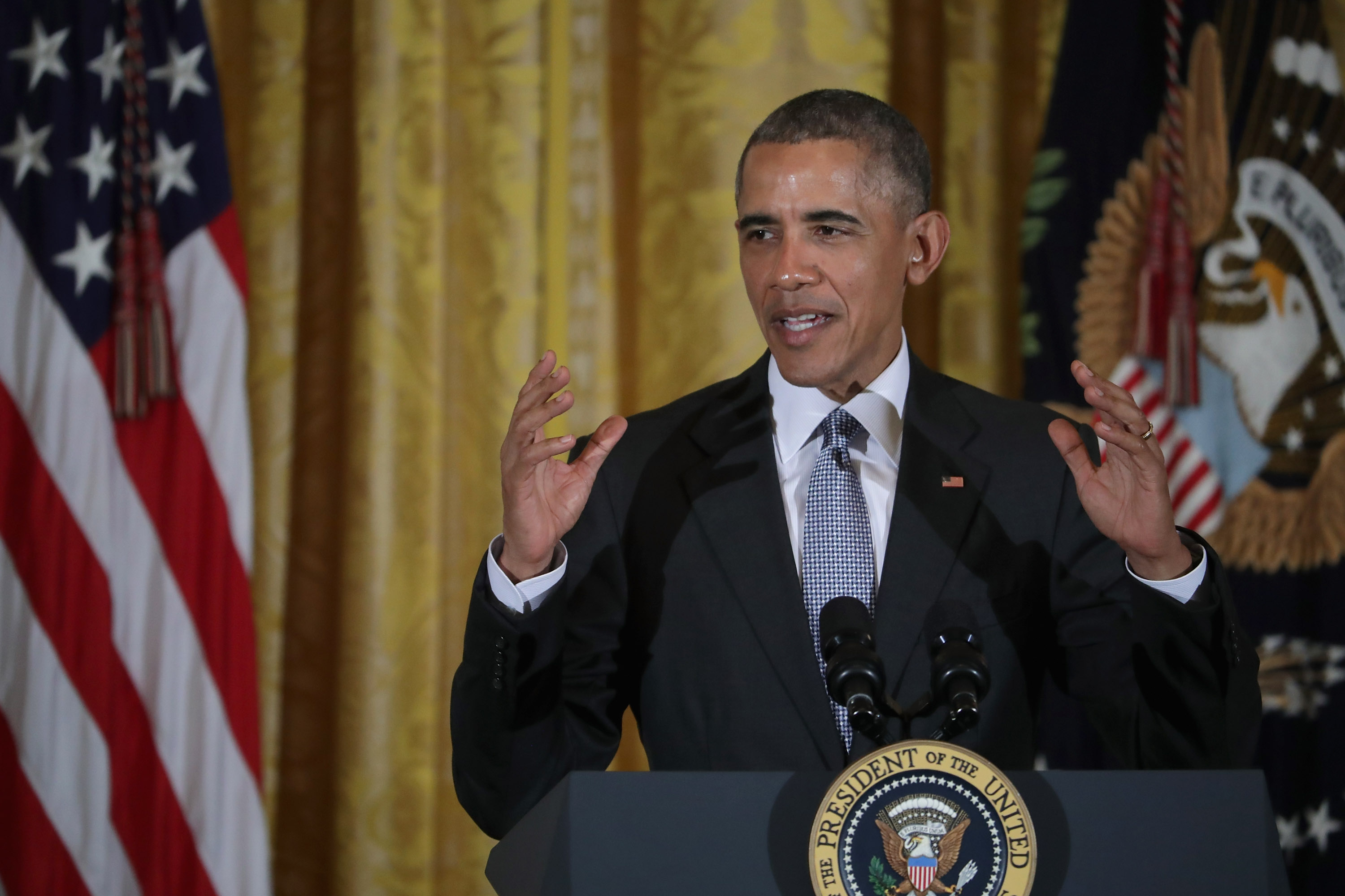 U.S. President Barack Obama delivers remarks during a reception for Women's History Month in the East Room of the White House in Washington, D.C., on March 16, 2016.