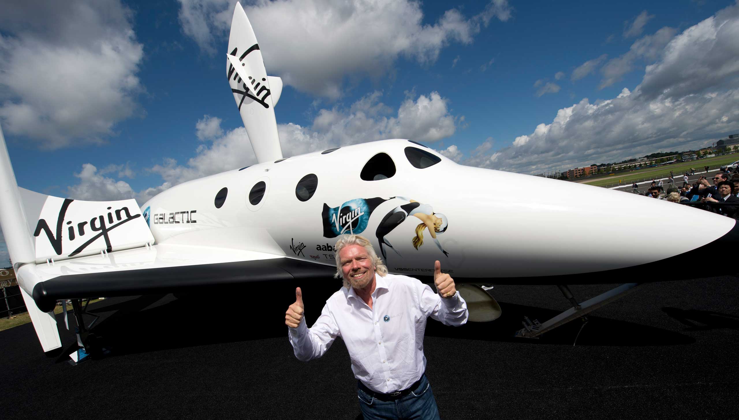 British billionaire Richard Branson pose