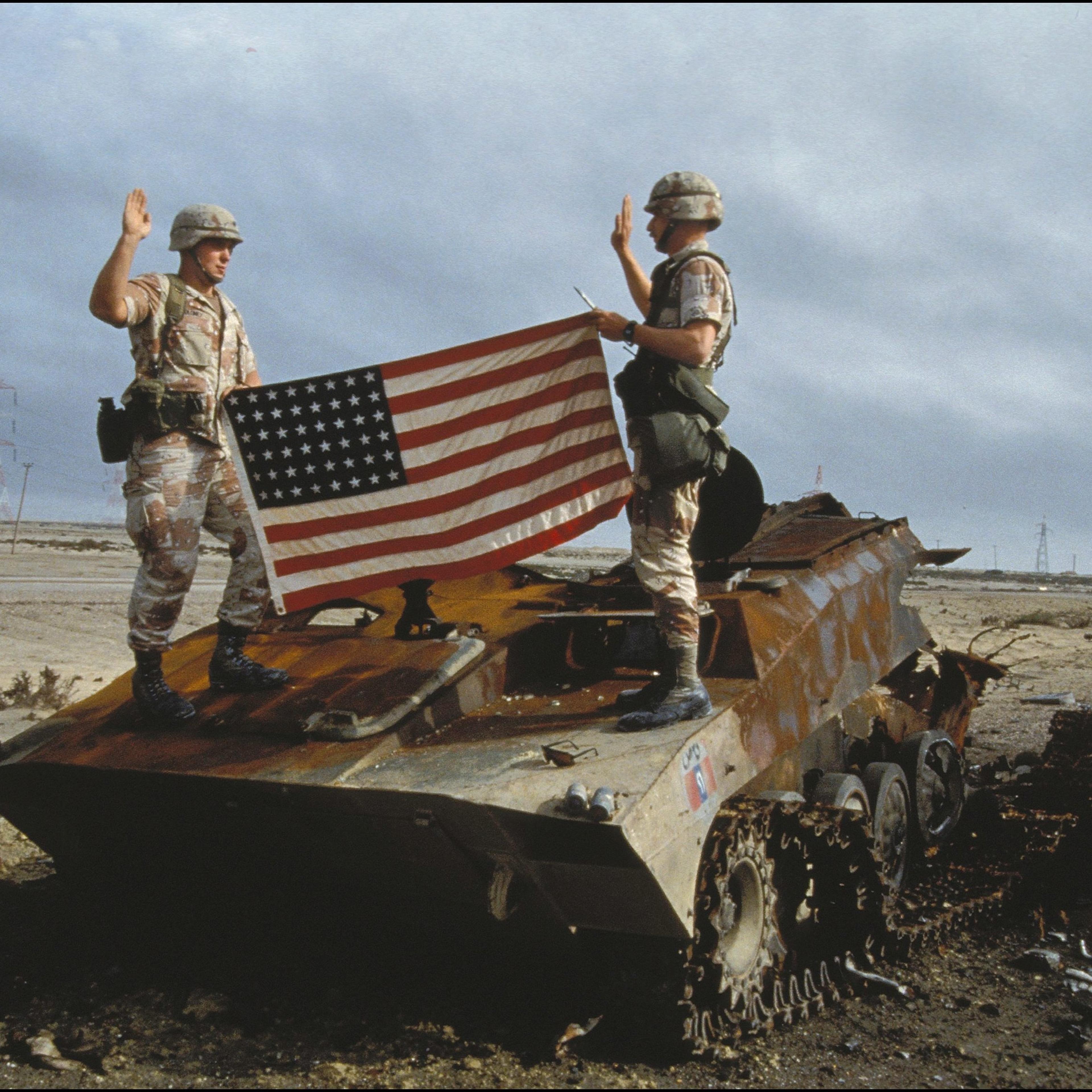 US soldiers take oath to the US army on an Iraqi destroyed tank in Iraq on February 27th, 1991.