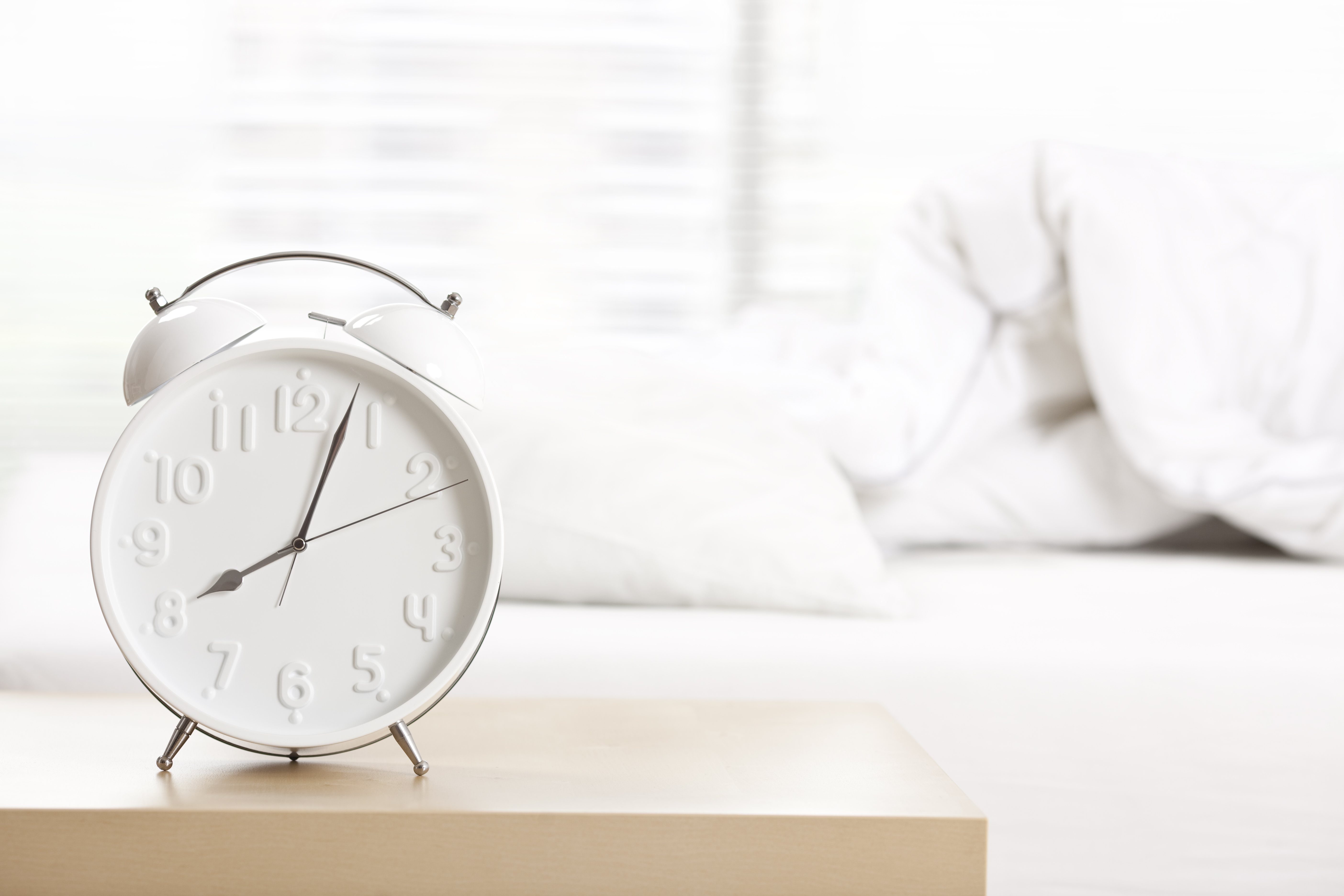 Alarm clock at sleeping room. TIME health stock