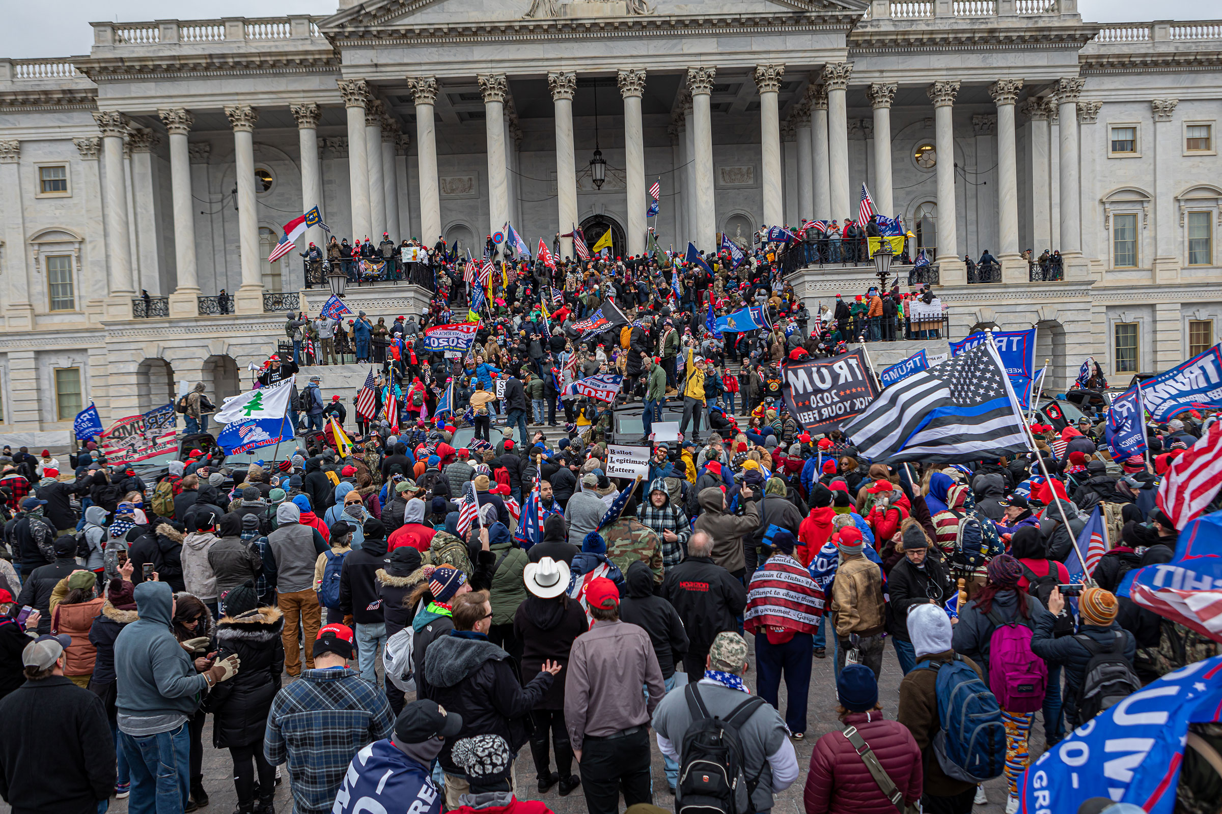 Protestors flood the U.S. Capitol Building in Washington, D.C. to protest Trump's election loss, on Jan. 6, 2021.