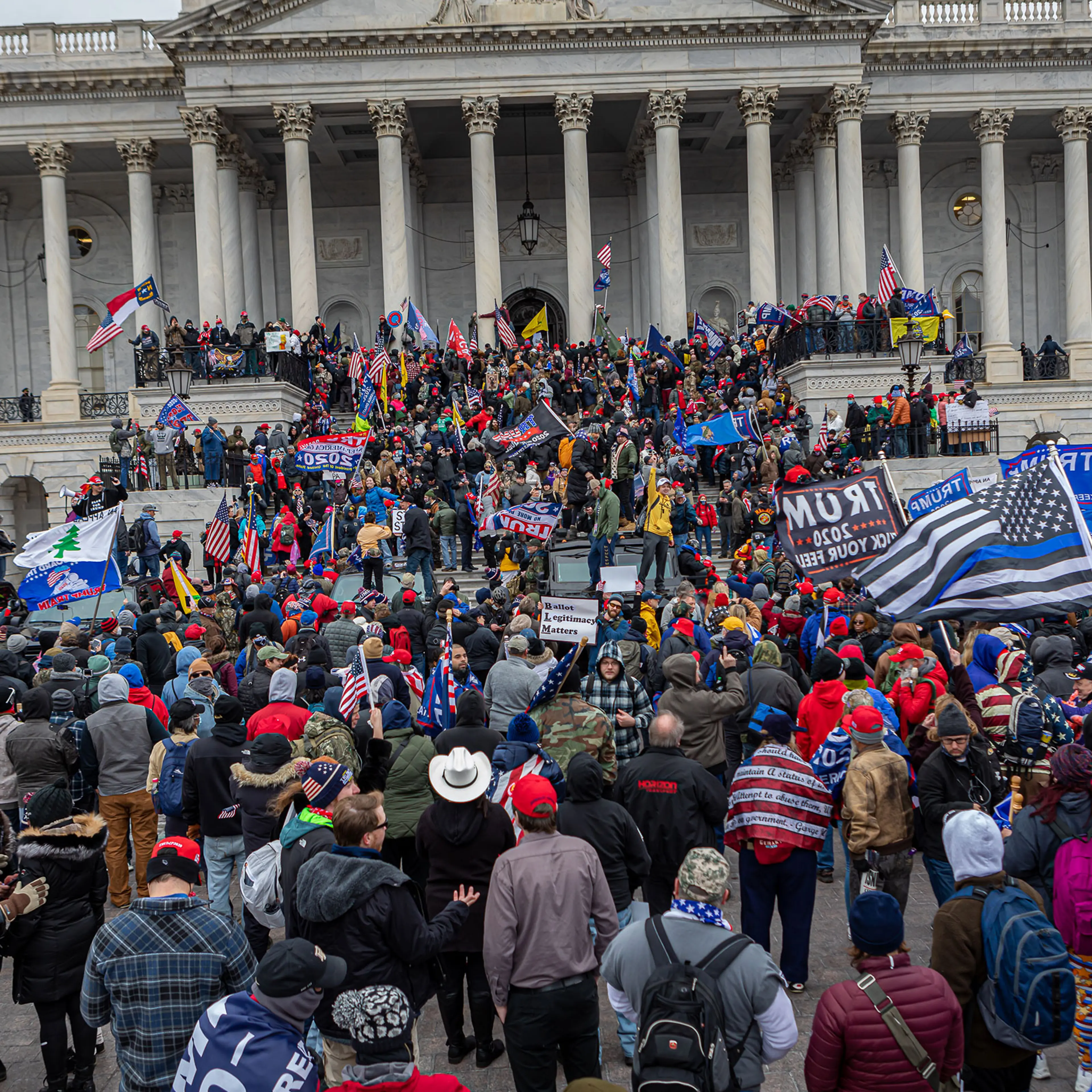 Protestors flood the U.S. Capitol Building in Washington, D.C. to protest Trump's election loss, on Jan. 6, 2021.