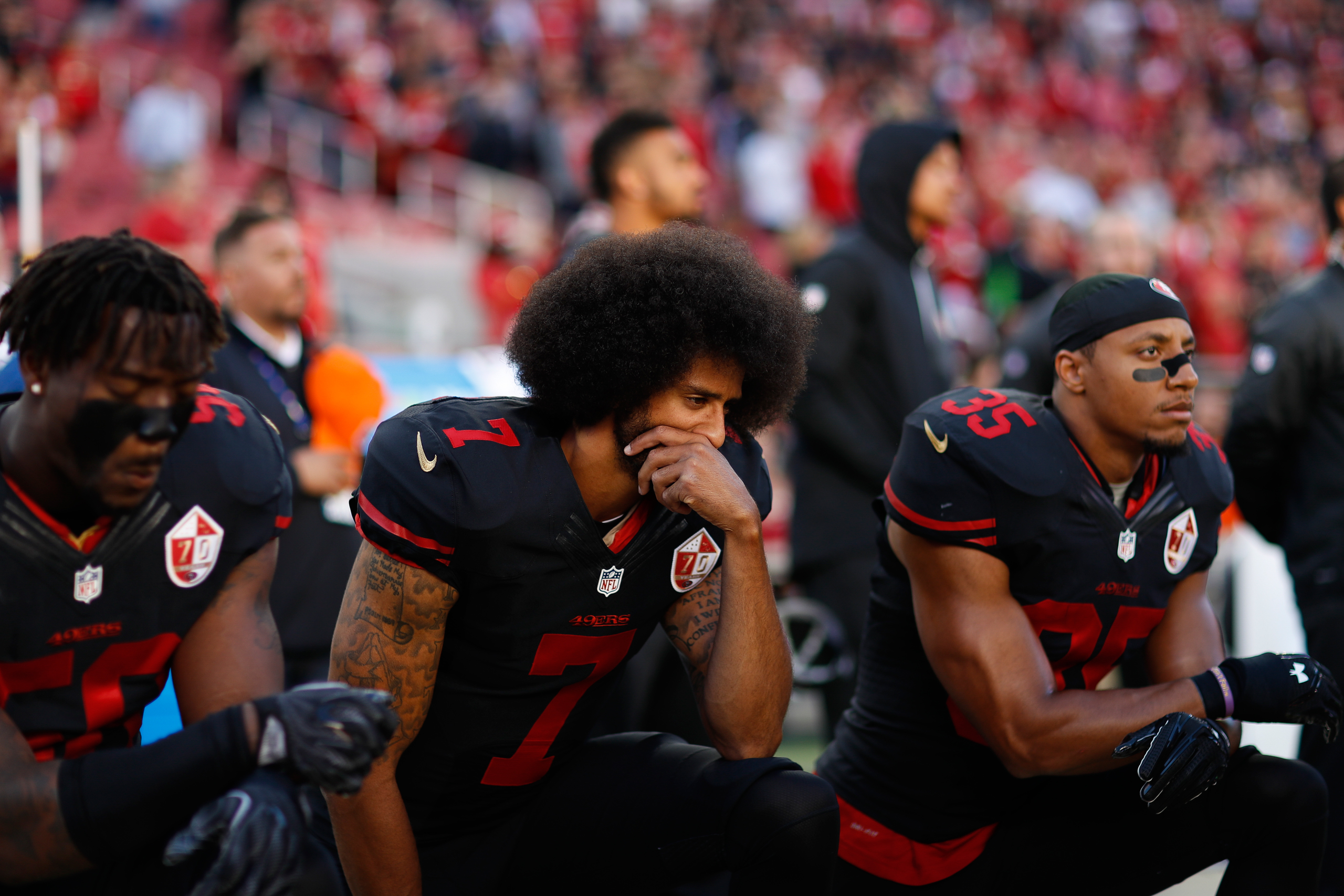 San Francisco 49ers quarterback Colin Kaepernick (7) kneels during the National Anthem prior to an NFL football game against the Arizona Cardinals on Thursday, Oct. 6, 2016 in Santa Clara, Calif. Arizona won 33-21. (Aaron M. Sprecher via AP)