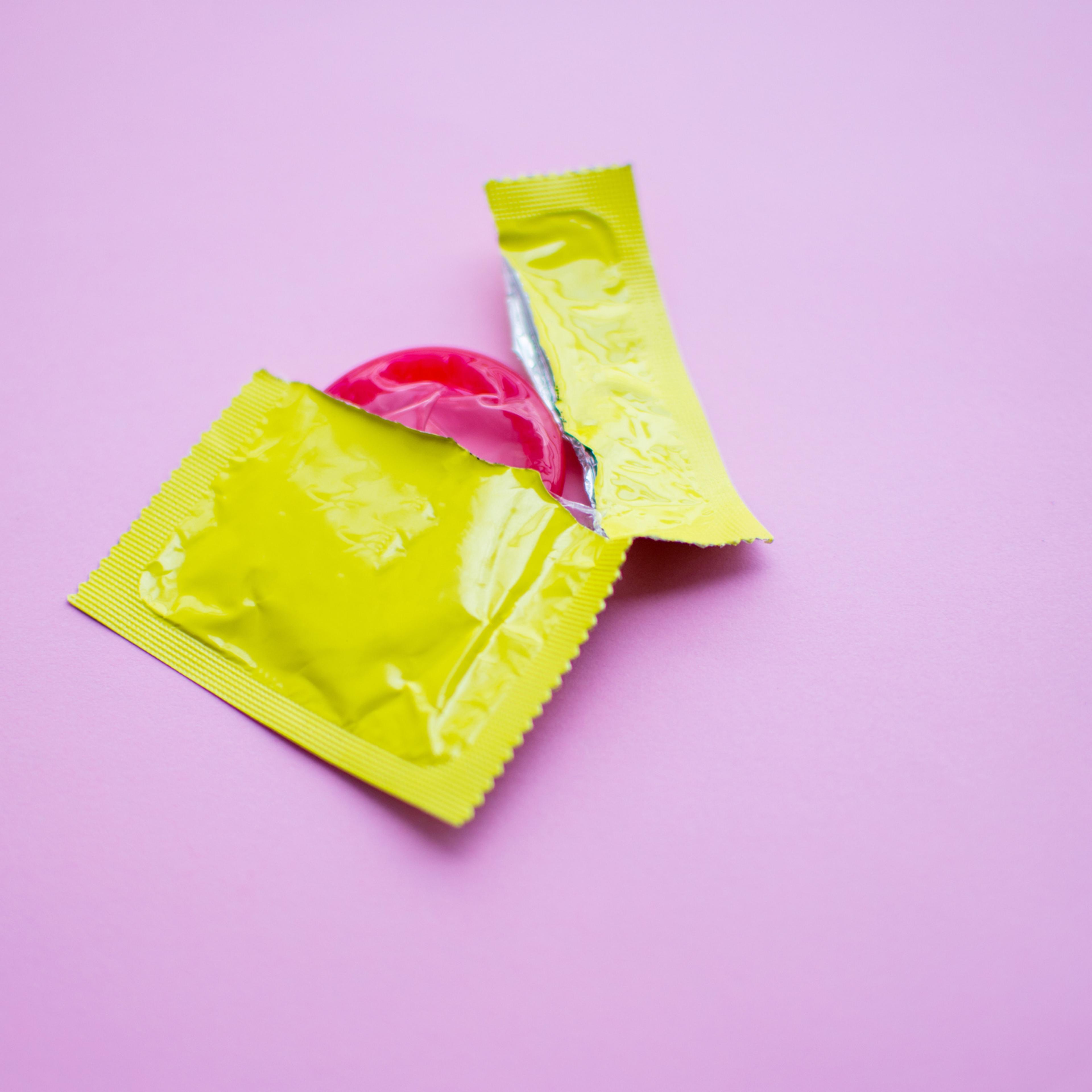 Close-Up Of Condom Packet On Table