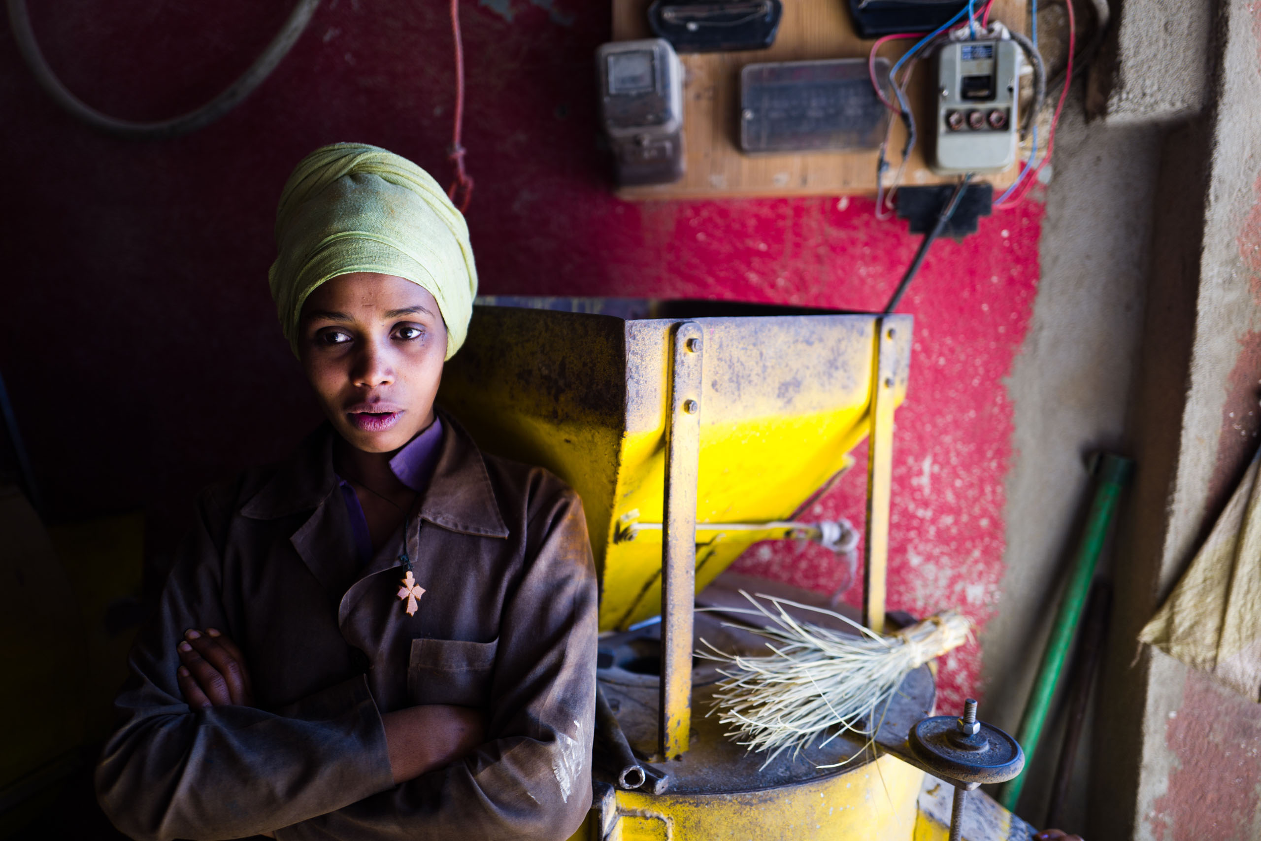 A woman at the berbere spice mixing market.