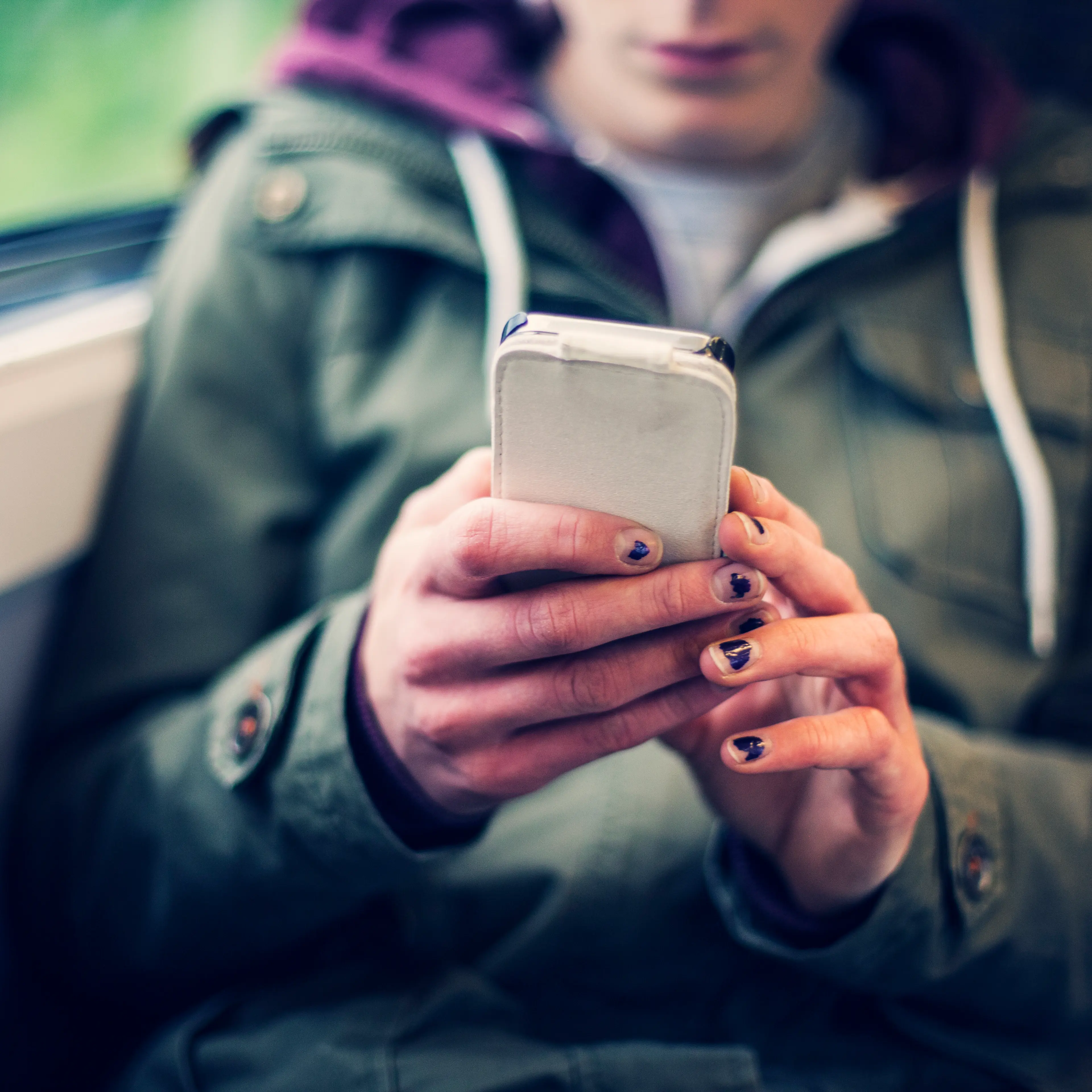 Teenage girl using a smart phone
