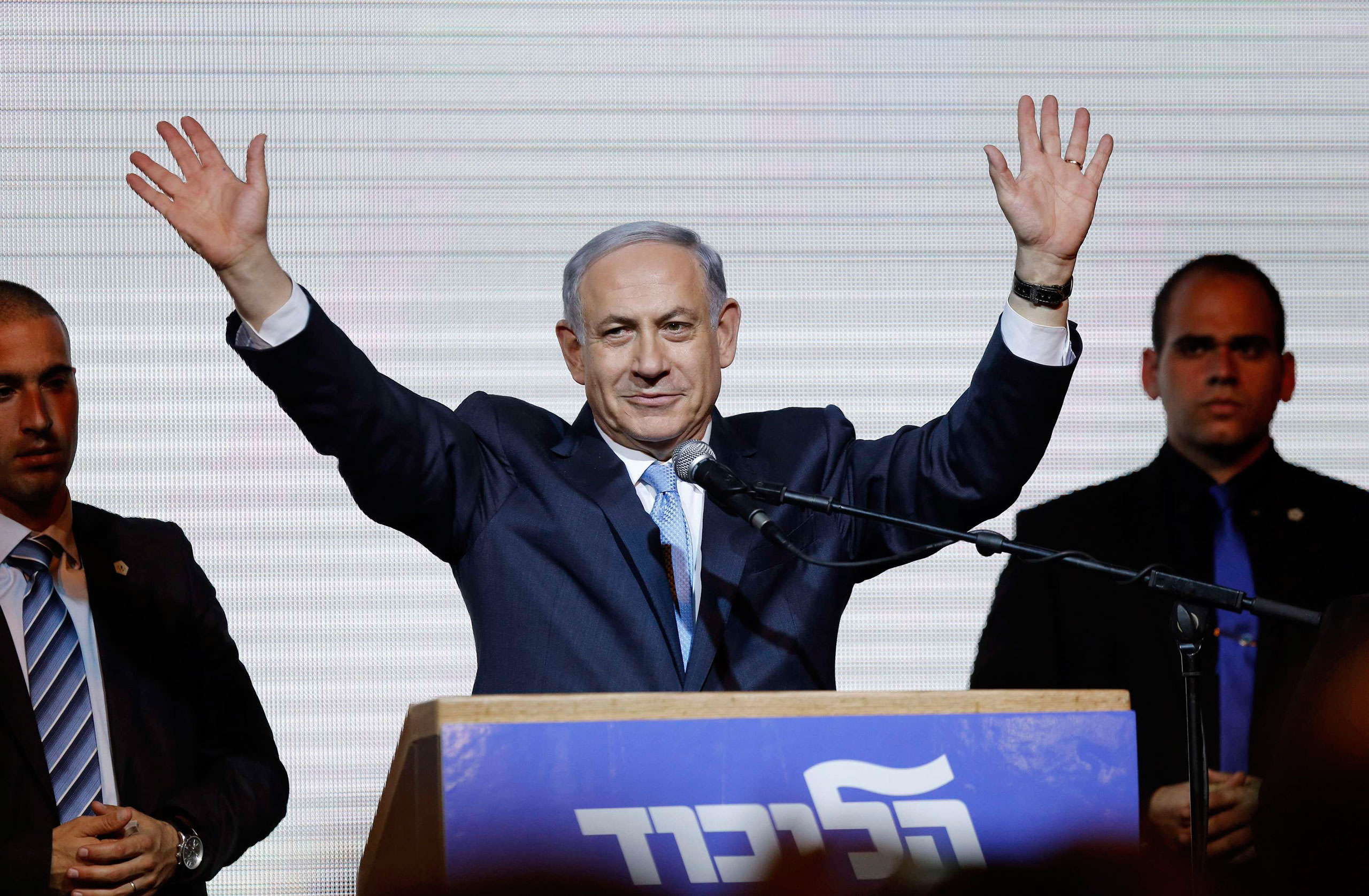 Israeli Prime Minister Benjamin Netanyahu waves to supporters in Tel Aviv March 18, 2015.